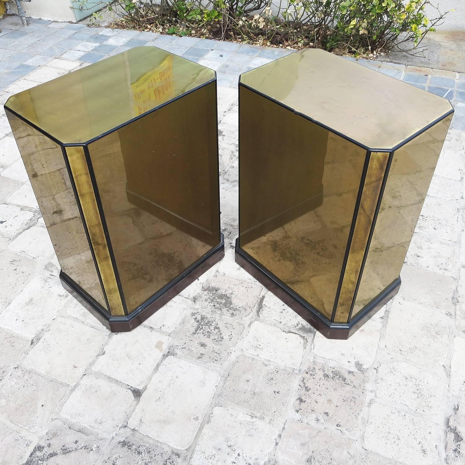 RETIREMENT SALE!!!  EVERYTHING MUST GO - CHECK OUT OUR OTHER ITEMS.				

Original 1970s brass veneered pedestals trimmed in lacquered wood with dark wood bases. The height makes them perfect for a dining table, to be topped with your custom glass