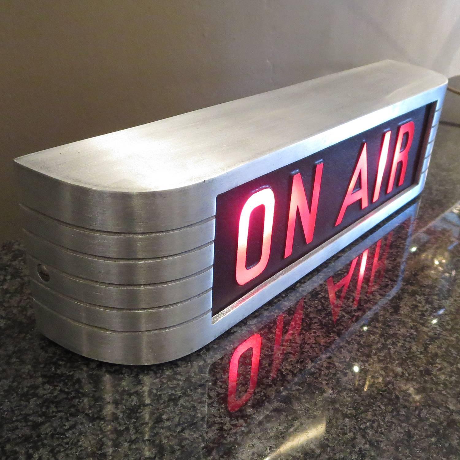 When radio and television stations were creating live programs, they had to have a signal to let one know that they were rolling, and not to interrupt. The finest 
