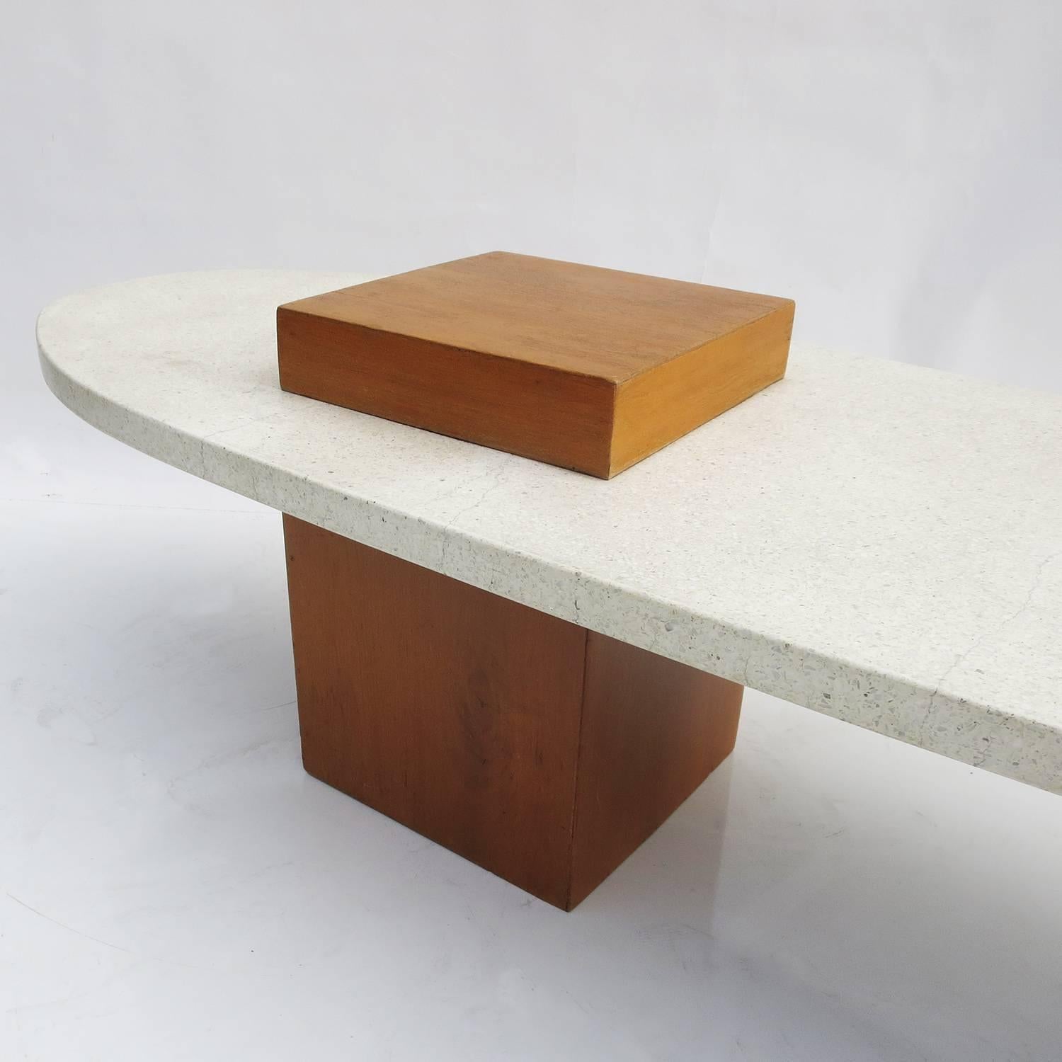 Harvey Probber (American 1922-2003) is known as the inventor of modular furniture, seating that was flexible in its layout. He formed Harver Probber Inc. in 1945, and created modern furniture into the 1970s. This table is formed terrazzo over a