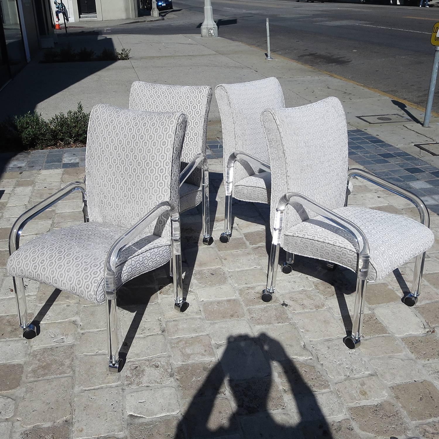 RETIREMENT SALE!!!  EVERYTHING MUST GO - CHECK OUT OUR OTHER ITEMS.

These elegant Lucite arm chairs by Pace are freshly recovered in a midcentury design textured silk velvet. They are perfect for a small dining or game table. The Lucite is in