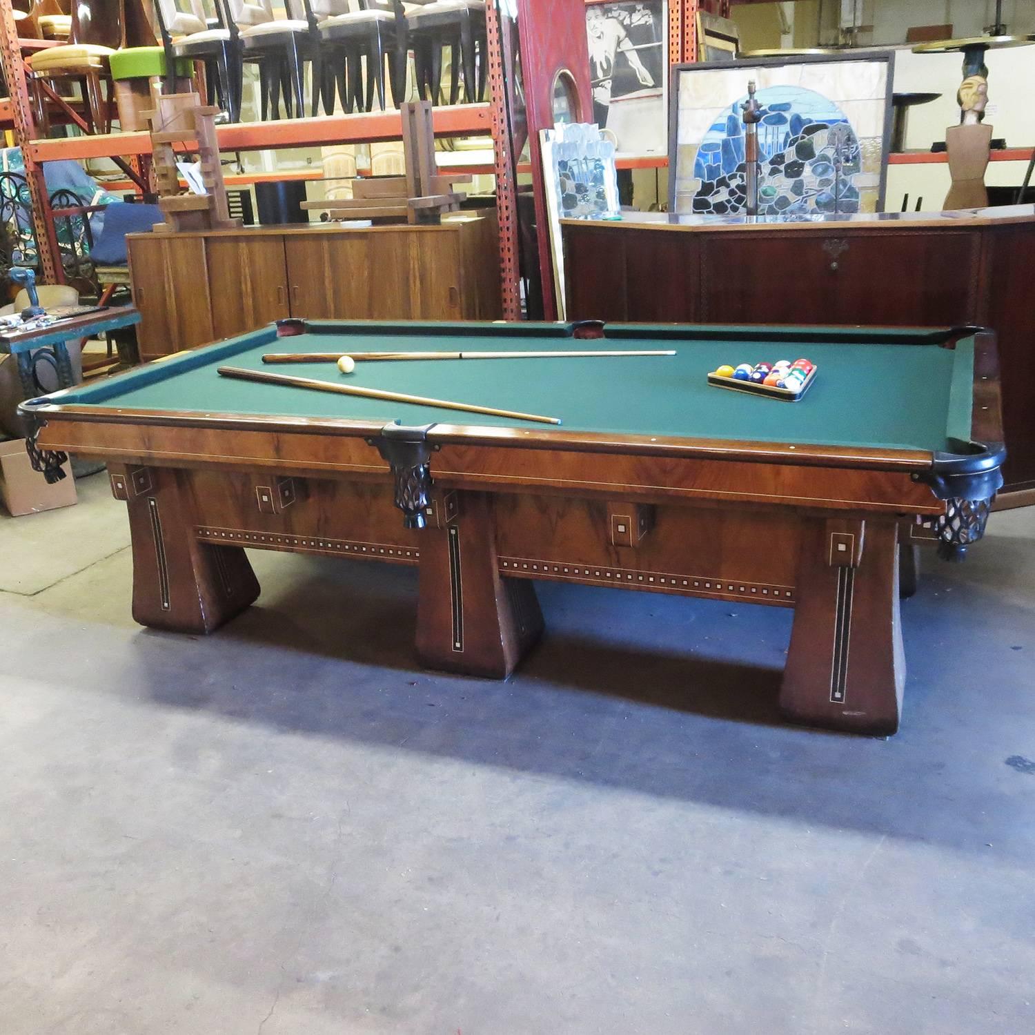 One of the finest pool tables ever created by the Brunswick Balke Collendar company was the Arcade model. The super deluxe version featured six legs instead of four, for extra stability and balance. These were considerably more expensive in the day,