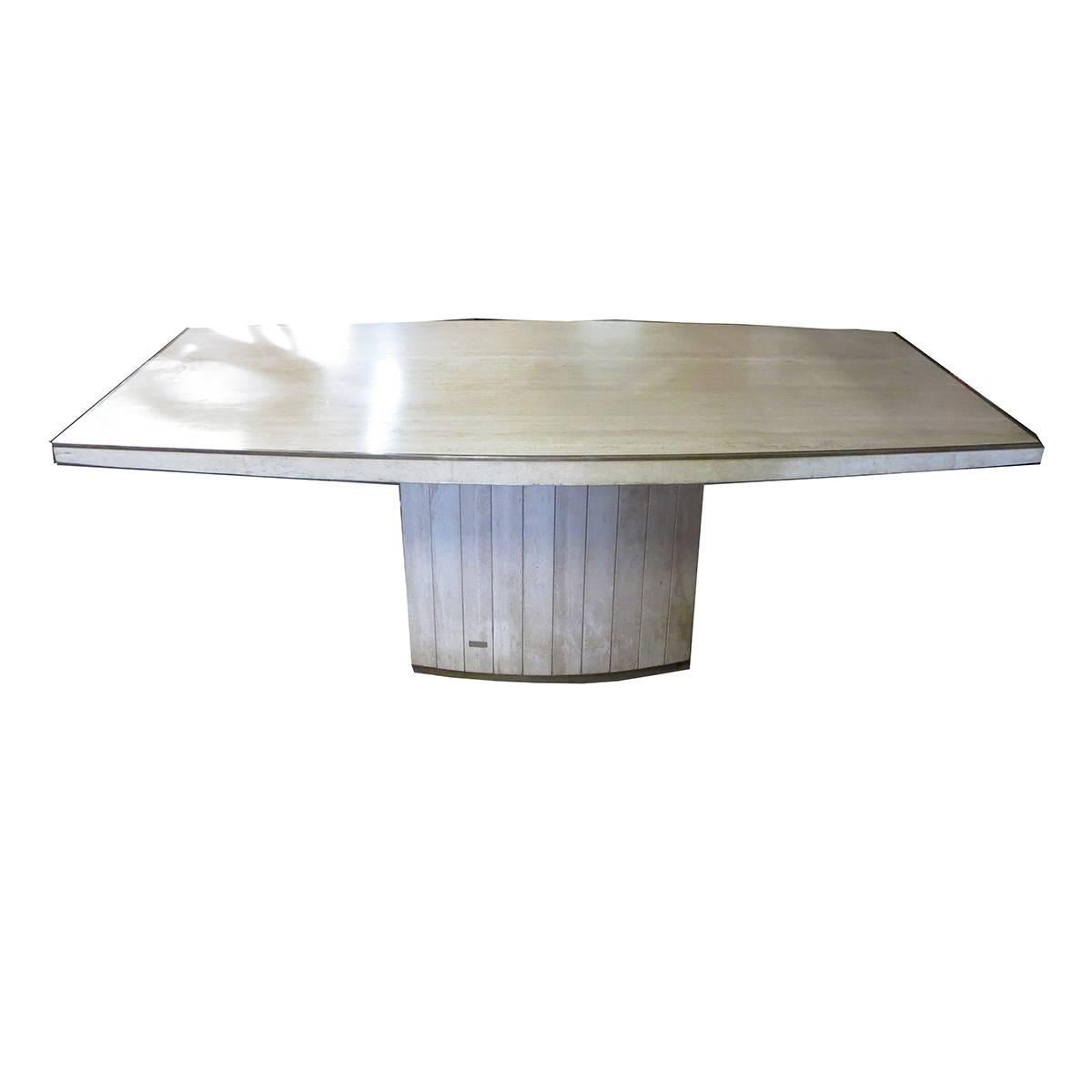 This beautiful and classic design was executed in travertine marble with brass accents. The table retains original Jean Charles Company brass label. The scale is well suited for any interior home or office space.