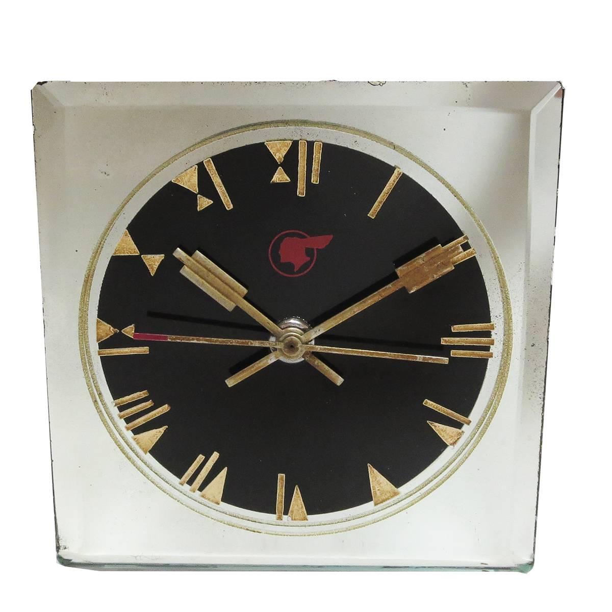This fabulous clock was made in very limited production for executives of Pontiac Motors. The 1930s mirrored clock was made by Crystal Bent Fyrart clocks, with a movement by the Waltham Watch Company. Made from a single piece of glass, the edges are