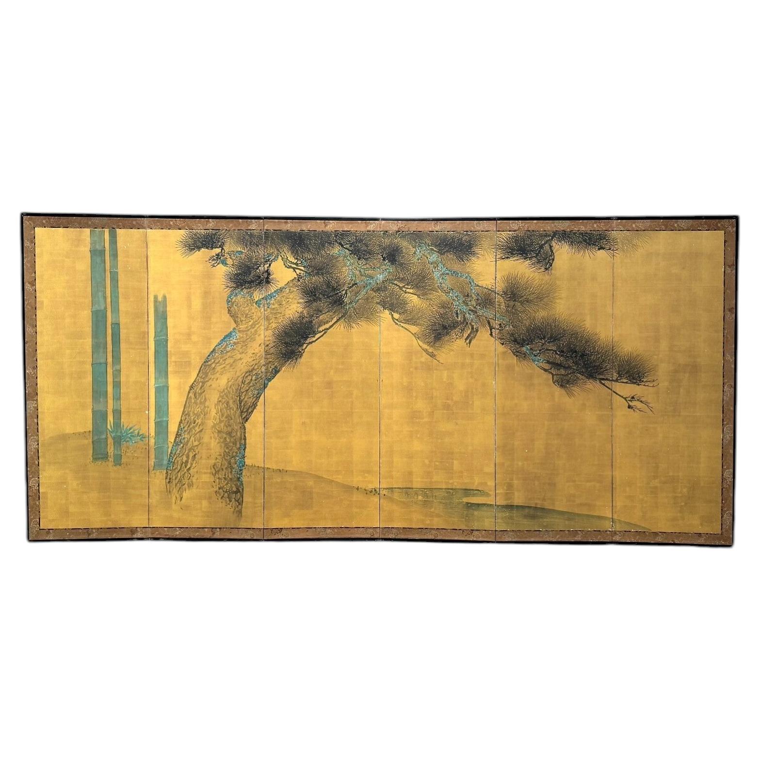 Paravent japonais à six panneaux représentant des pins et des bambous anciens, XIXe siècle
