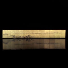 Paravent japonais à 12 panneaux recouvert de feuilles d'or, représentant un paysage panoramique, début du XXe siècle