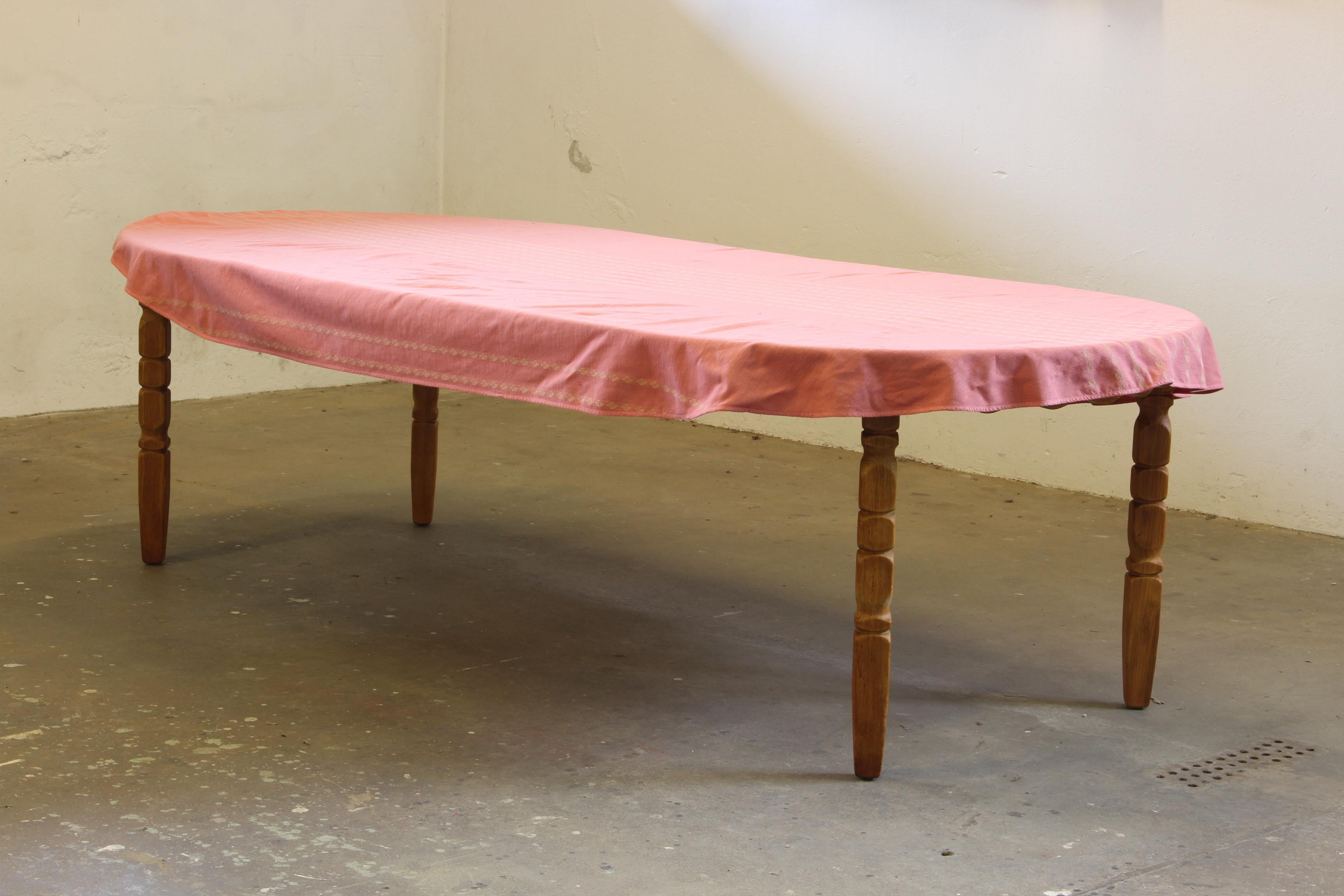 1960s Danish Round Extendable Dining Table in Oak style of Henning Kjærnulf For Sale 8