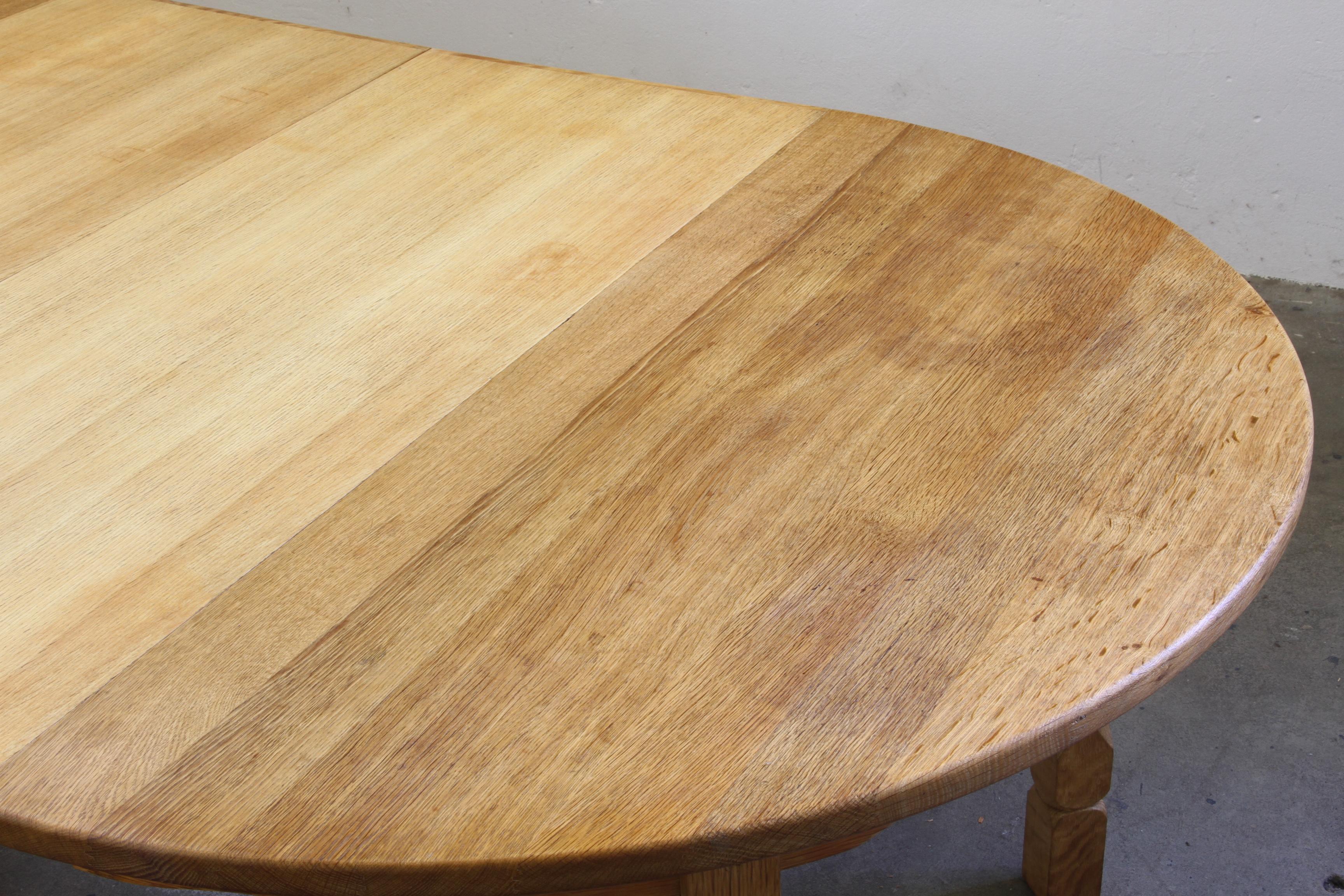 1960s Danish Round Extendable Dining Table in Oak style of Henning Kjærnulf For Sale 9
