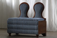 Divano-contenitore vintage e insolito, dalle forme scultoree, risalente agli inizi del XX secolo, anni ’20