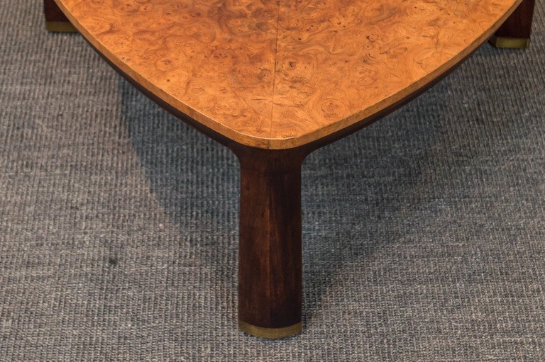Edward Wormley design for Dunbar Furniture Co. Model 6029
Perfectly refinished burl elm top on sculpted mahogany base with brass feet.
