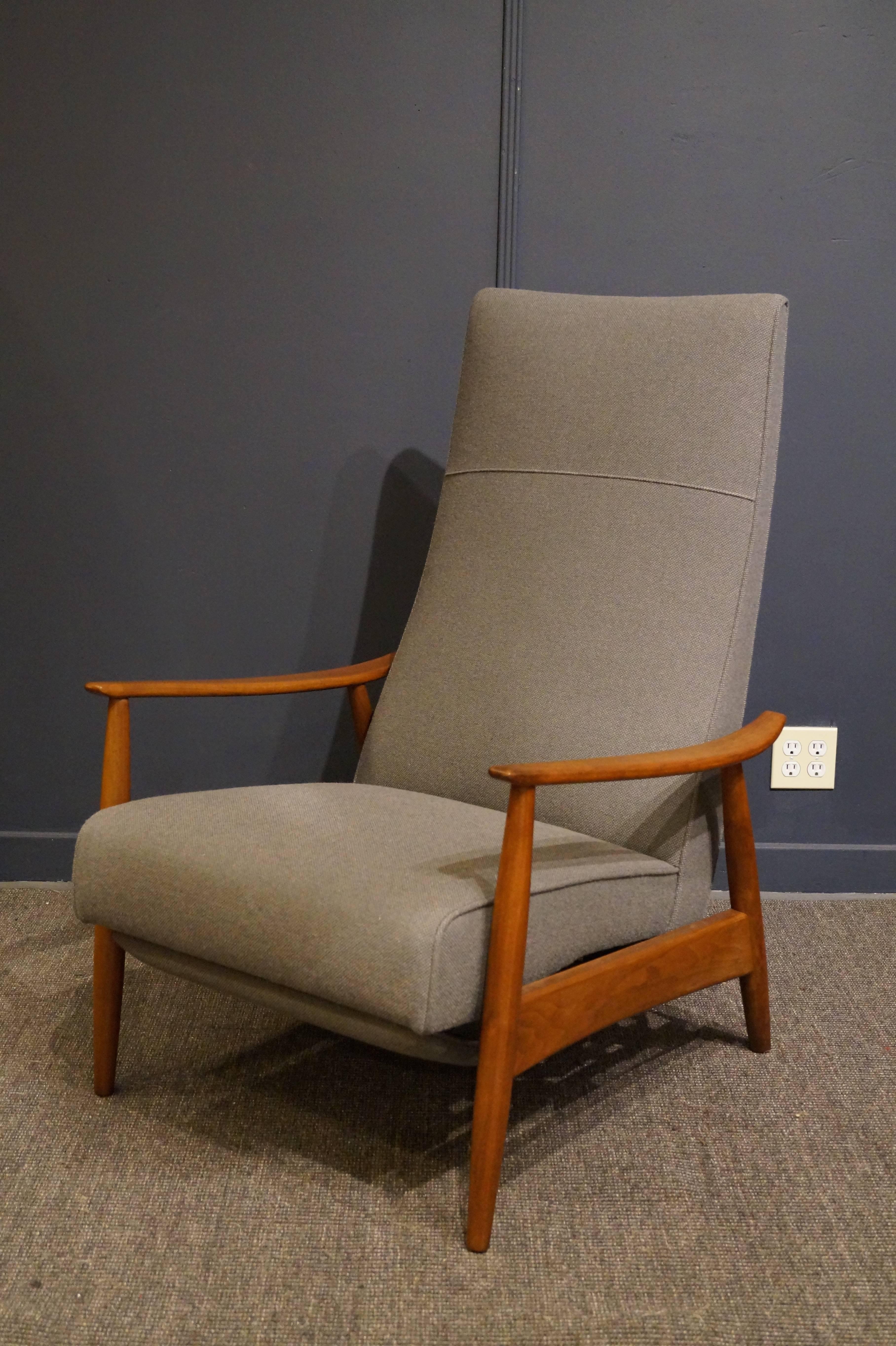 Milo Baughman design walnut high back lounge chair. Super comfy recliner with generous proportions, two different positions and an extending footrest. 
Perfectly refinished and newly upholstered in Maharam wool.