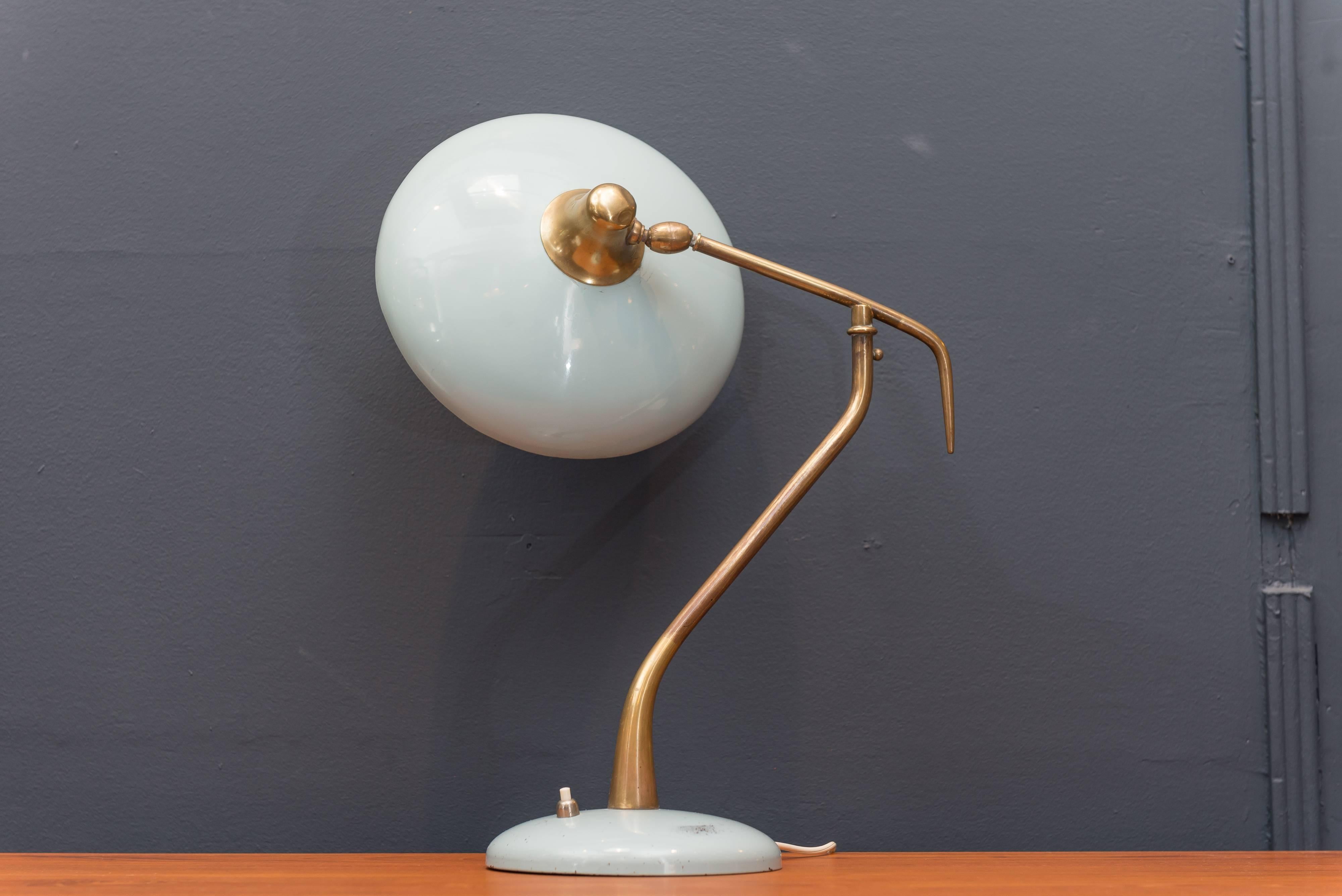 Oscar Torlasca design desk lamp for Lumi, Italy. In very good original condition robin's egg blue enamel with patinated brass, Circa 1950.