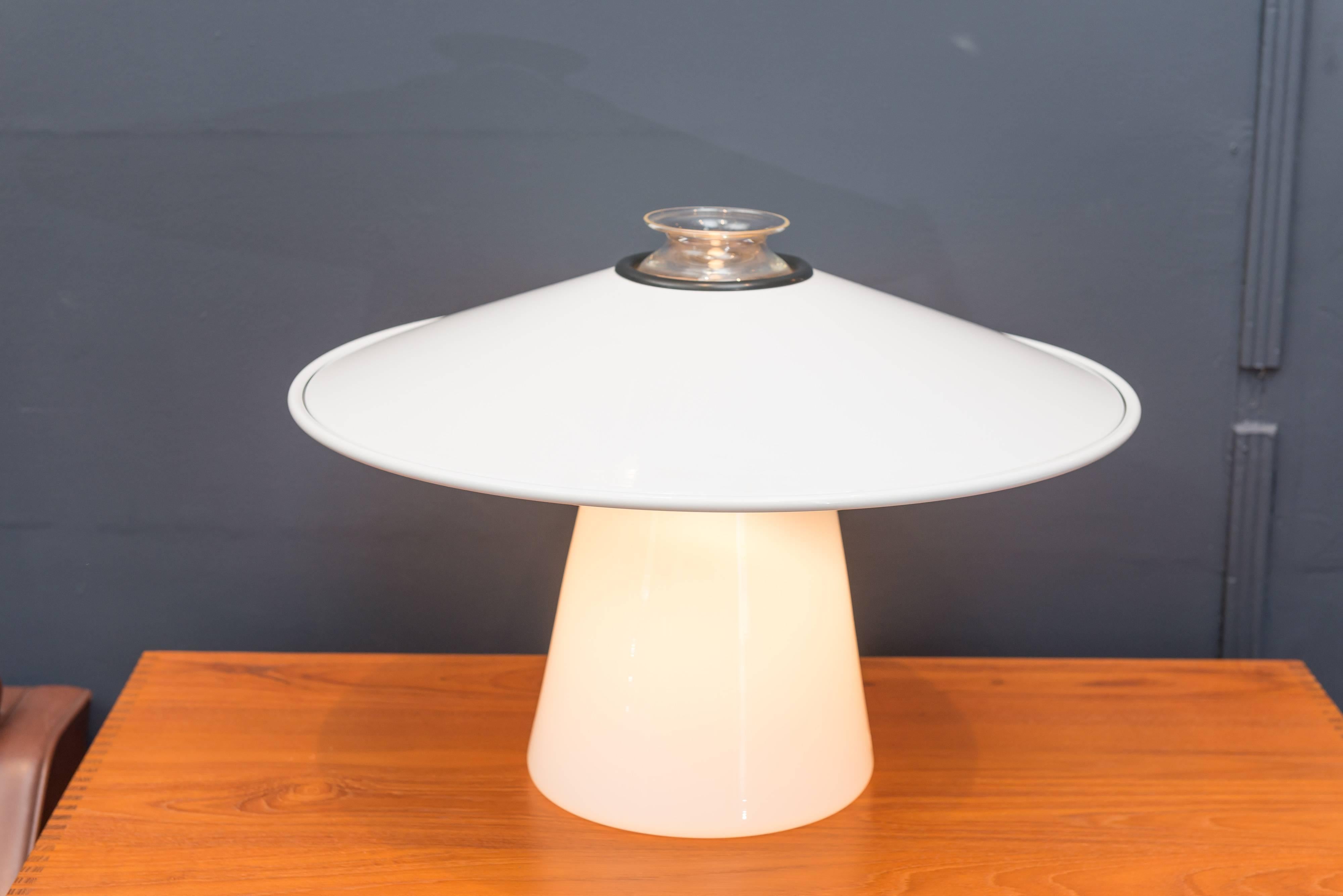 Stilnovo illuminated blown glass table with a white enamel adjustable tilting shade. Excellent condition, labeled.