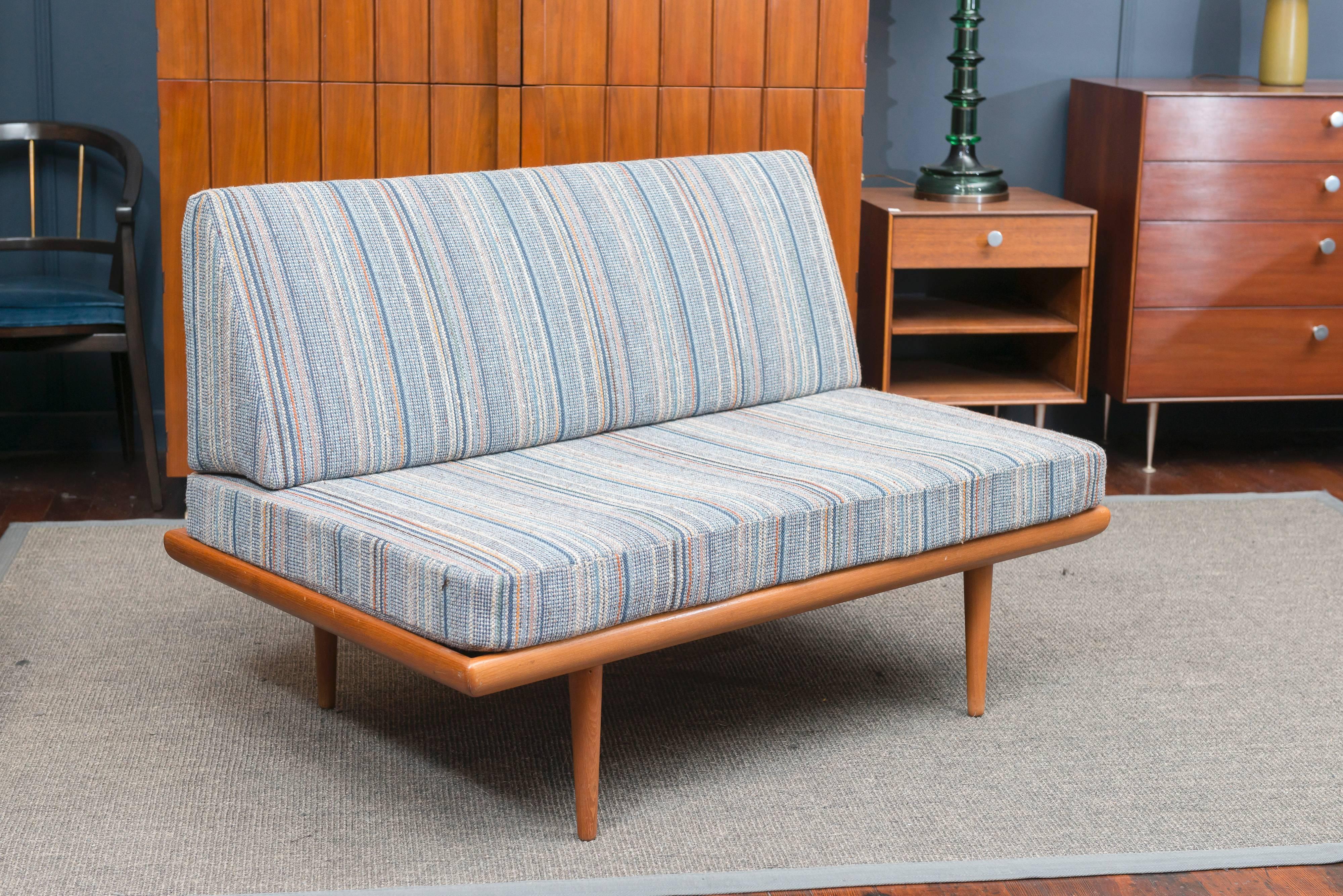 Peter Hvidt and Orla Molgaard teak sofa or settee designed for France & Daverkosen. Excellent original vintage condition, labeled.