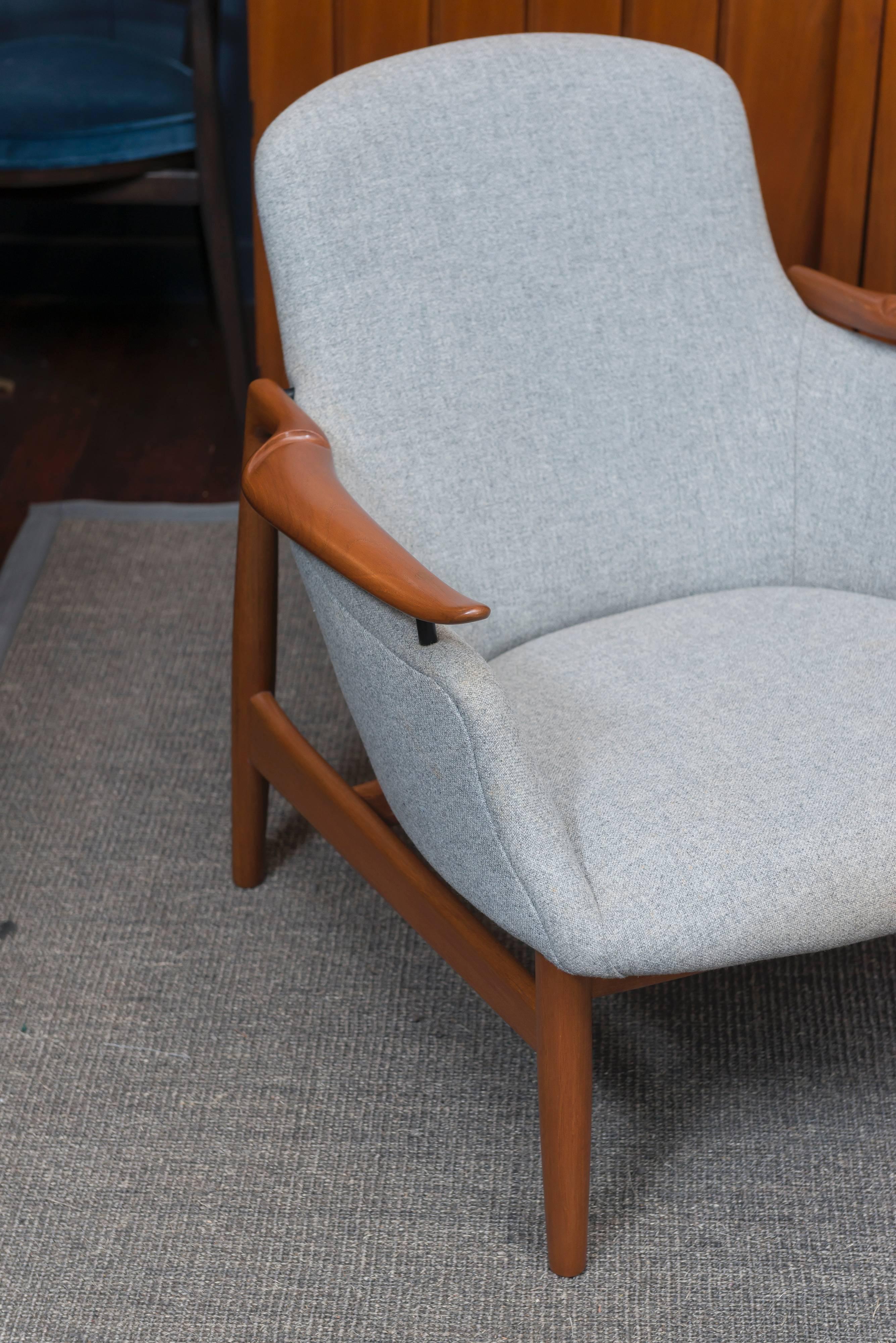 Rare pair of Finn Juhl design teak lounge chairs for Niels Vodder, Denmark. Perfectly refinished and newly upholstered, labelled.