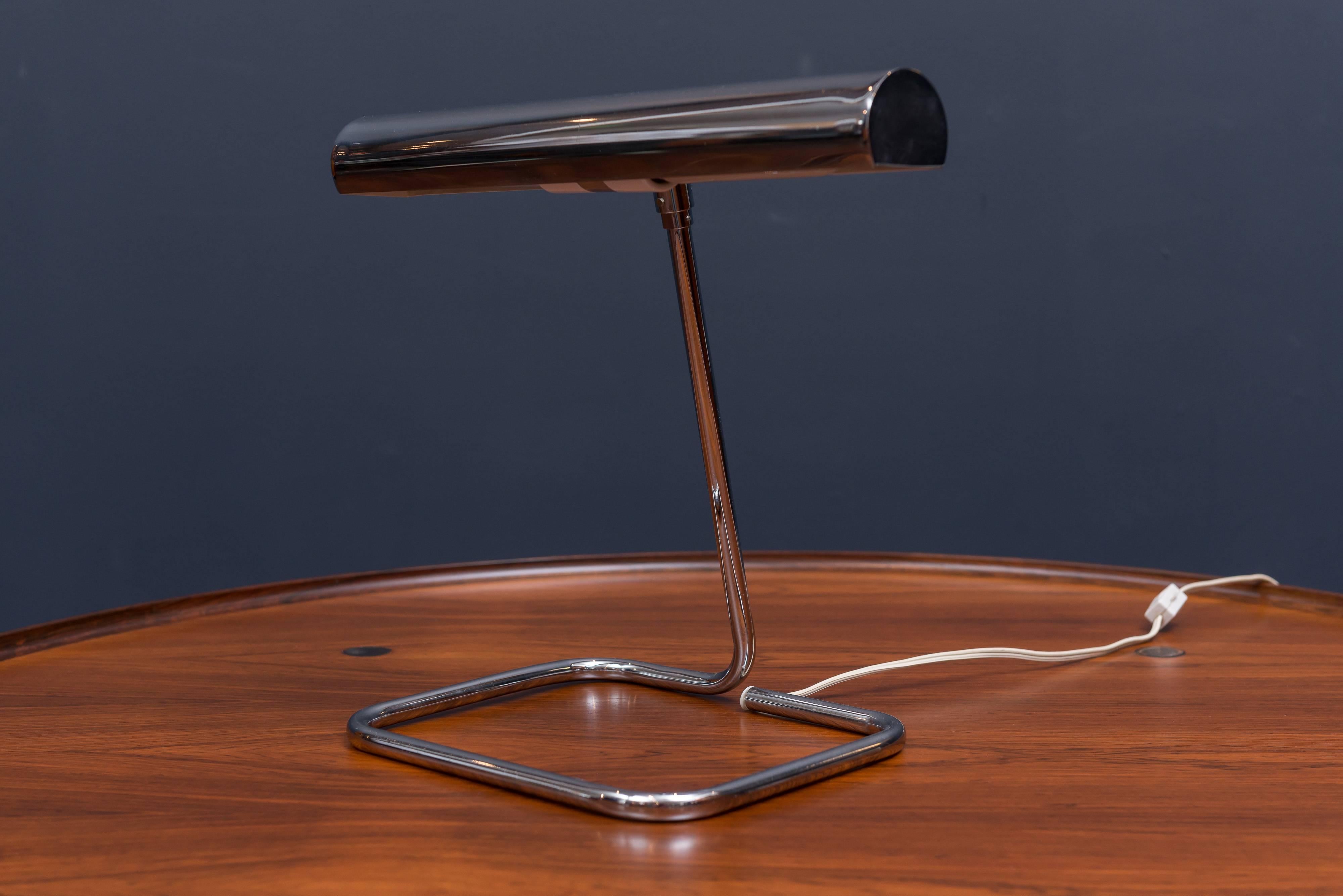 Elegant articulating chrome desk lamp made by Koch & Lowy in excellent original condition.