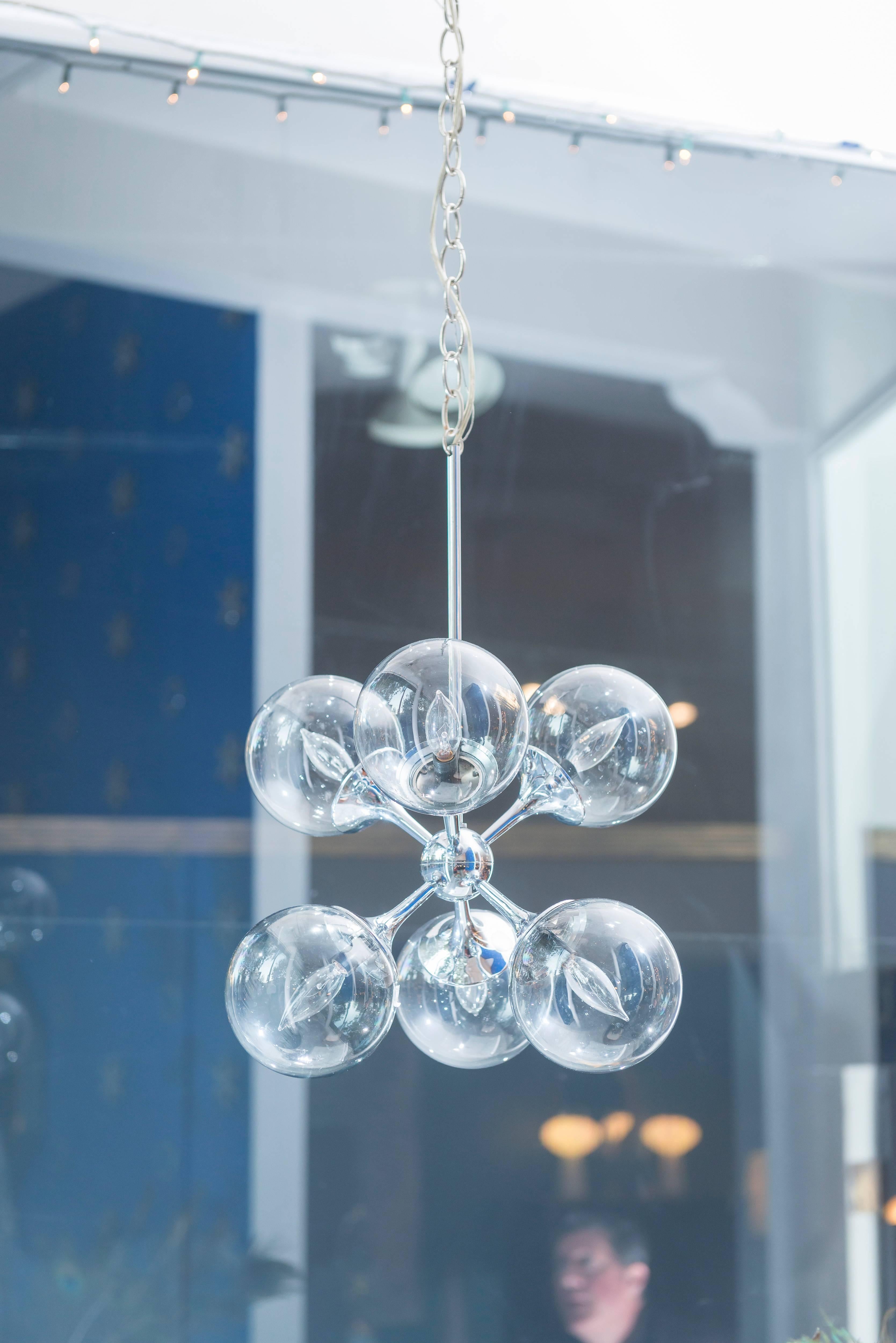 Timeless chrome six-light Sputnik chandelier in excellent original condition with 12ft. of chrome chain.