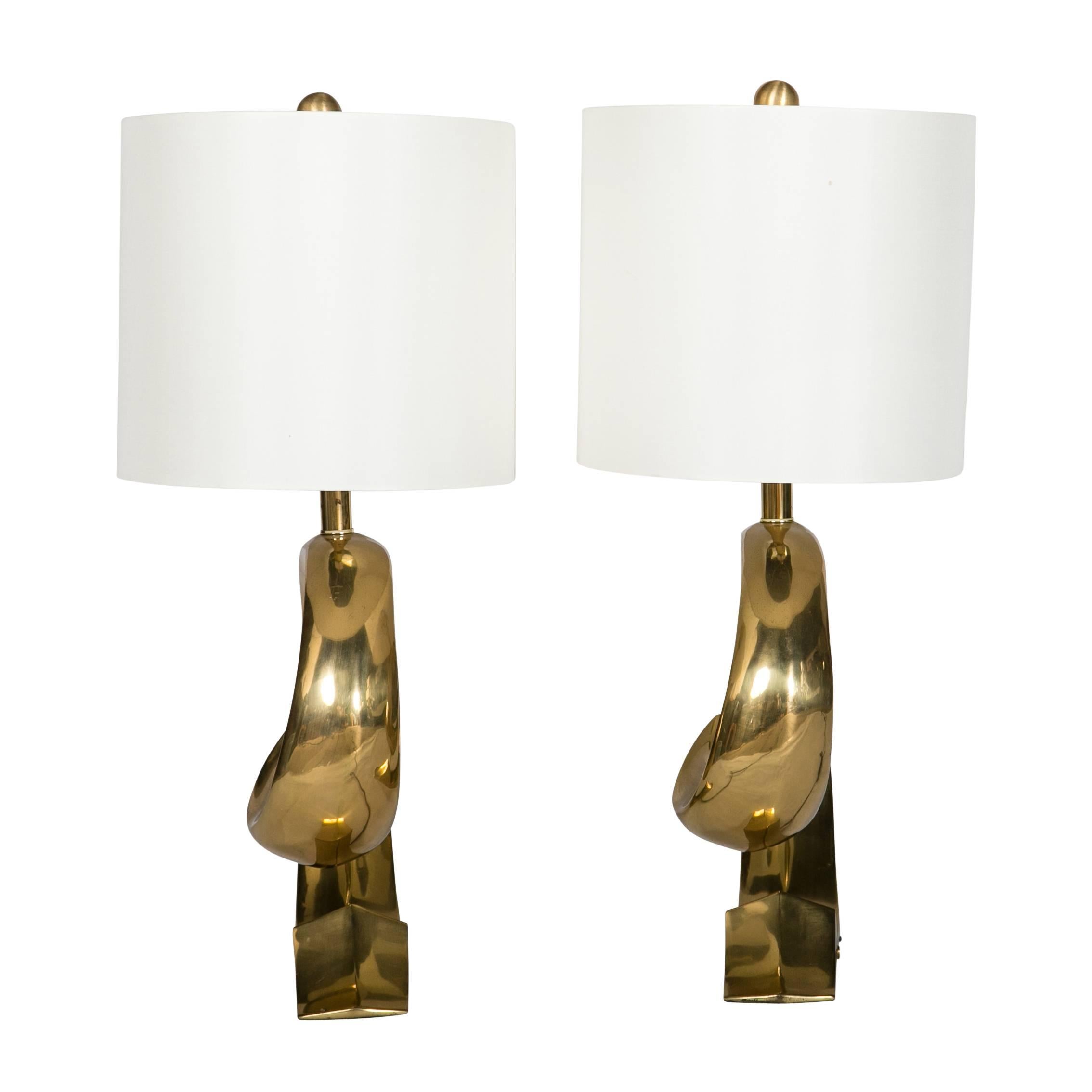 Pair of brass lamps in the form of the Pierre Cardin signature logo.