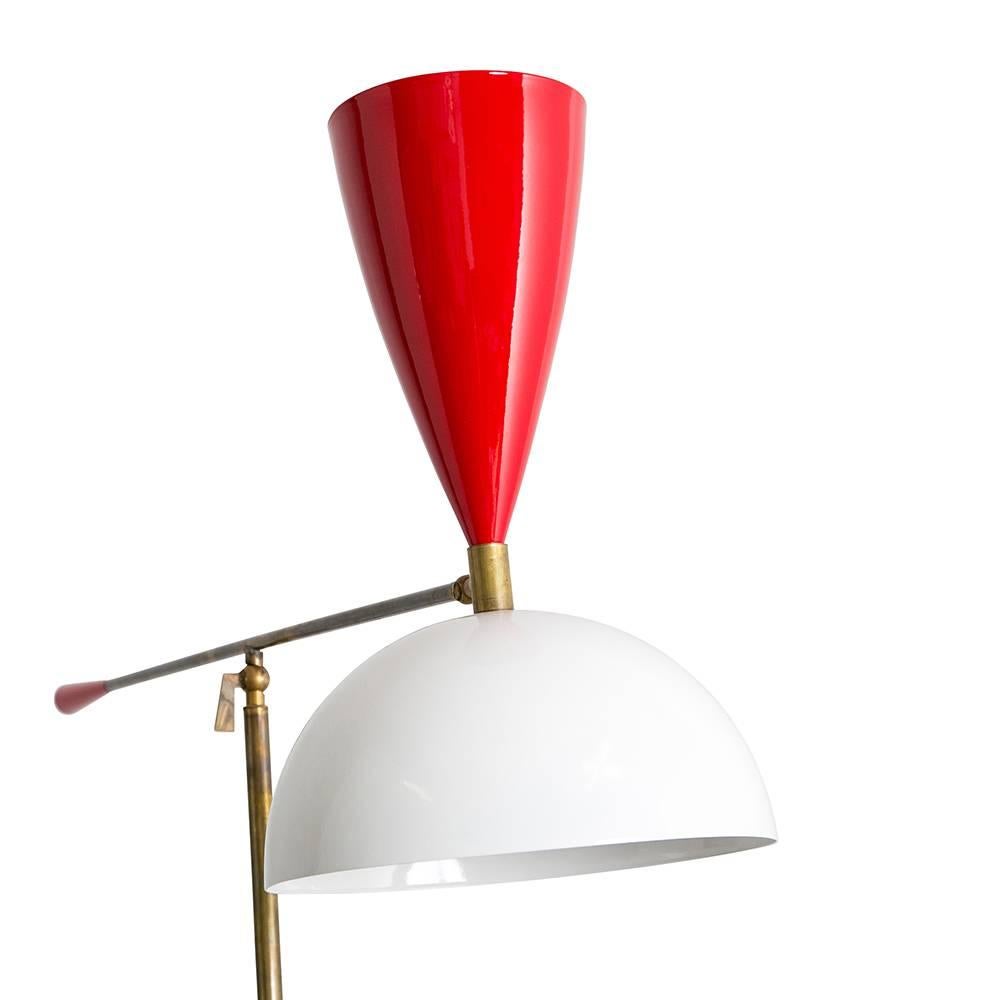 Articulated brass floor lamp with gloss enamel shade and handle on marble base.
   