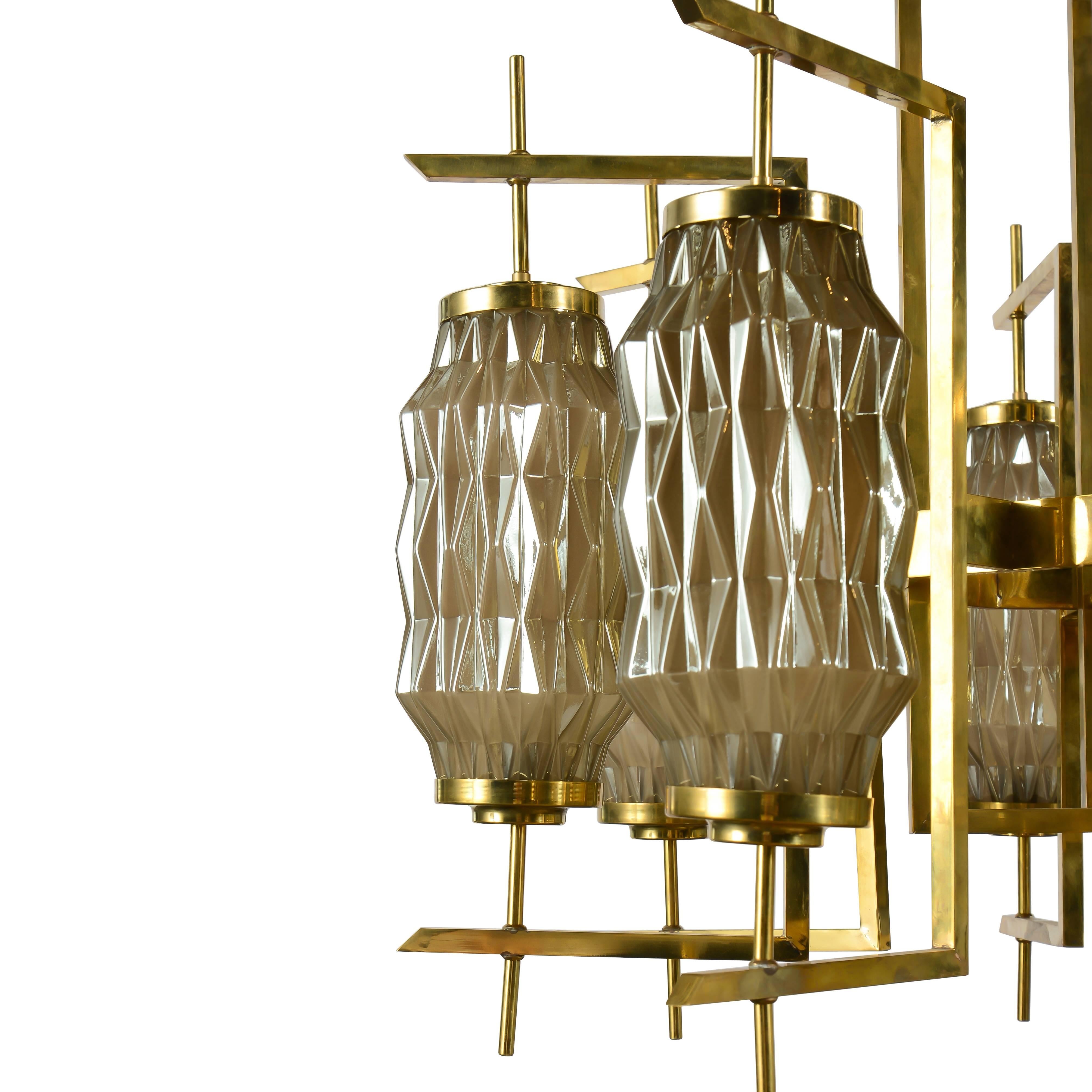 Eight-light brass chandelier with smoked glass diamond geometric shades. Priced individually. Pair available.