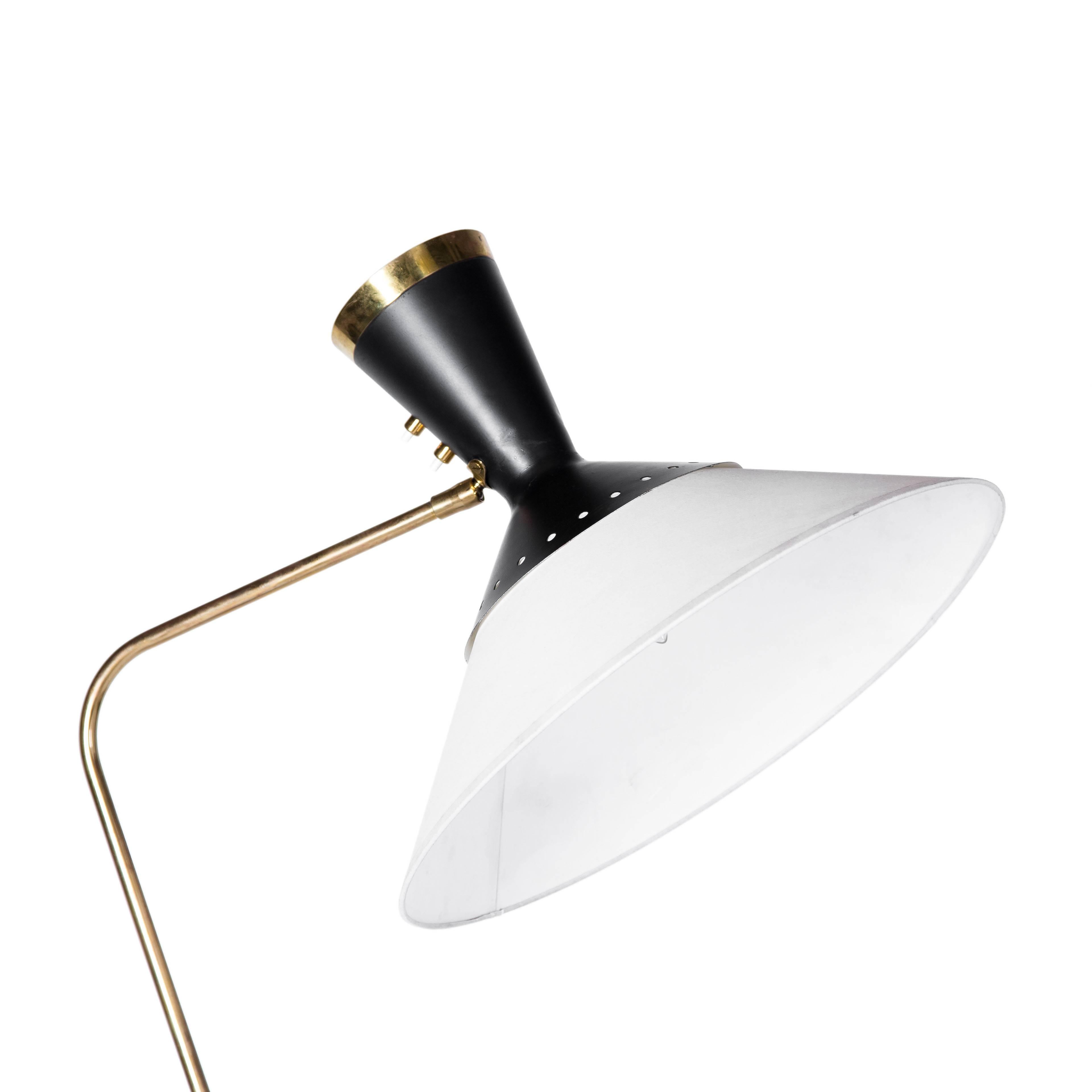 Formed double end shade on lacquered and brass neck with ball joint adjustable base. Uses (2) candelabra base light bulbs. 

Newly rewired for use in the United States. Shade is 16