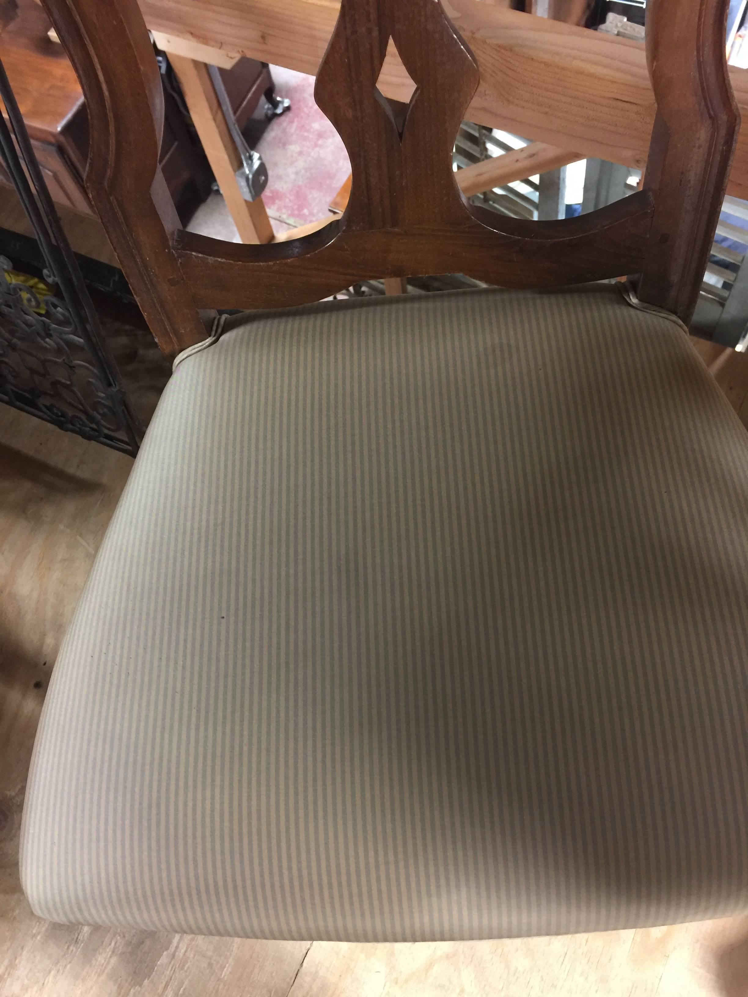 1920s Venetian Walnut Chair ( two available) have been reupholstered with silk striped fabric as seen in the photos. One chair has some small stains.
19''w x 15''d x 40''h seat 18''h