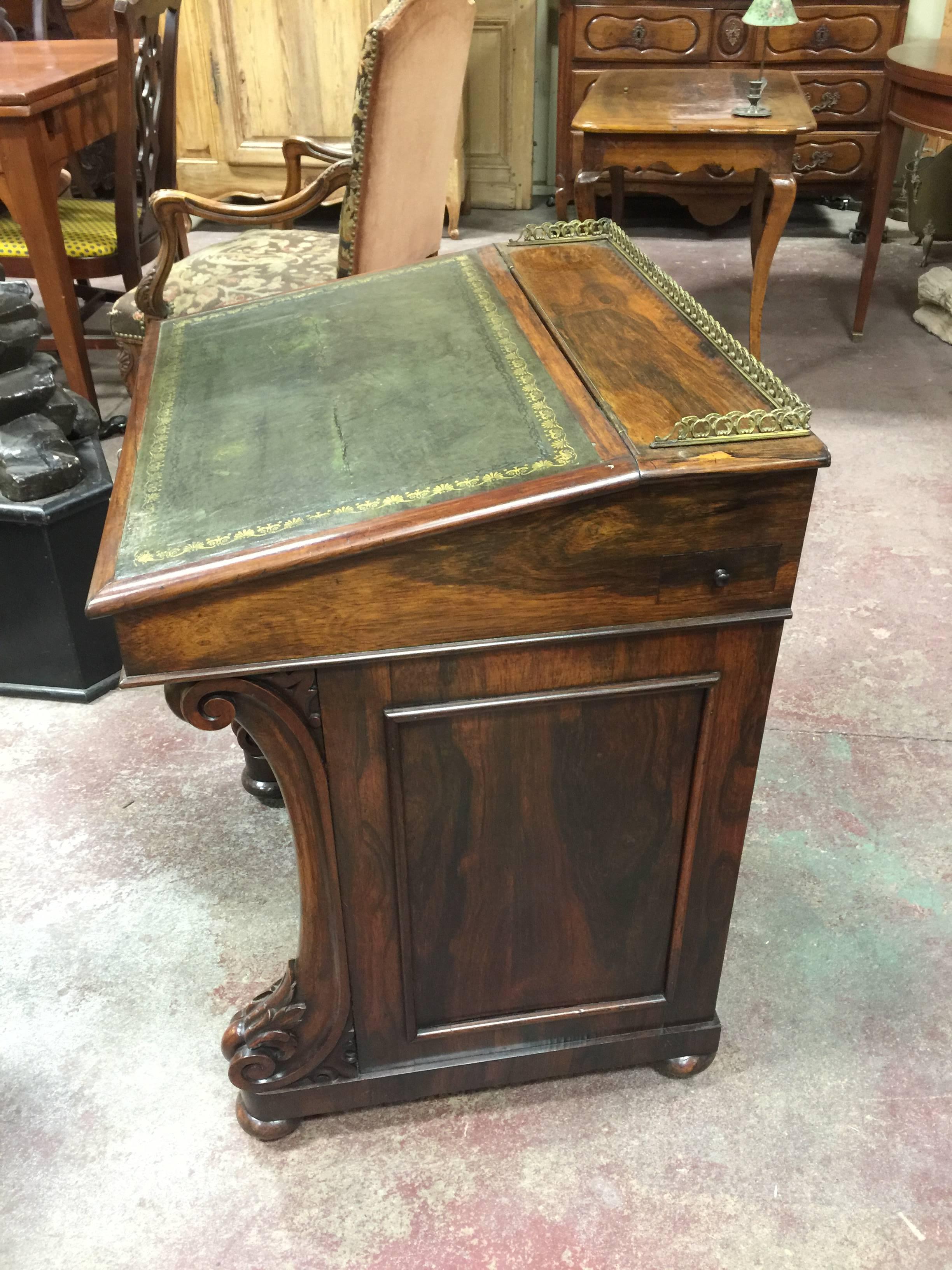 Mid-19th century Davenport desk with original leather top.
Brass gallery . 