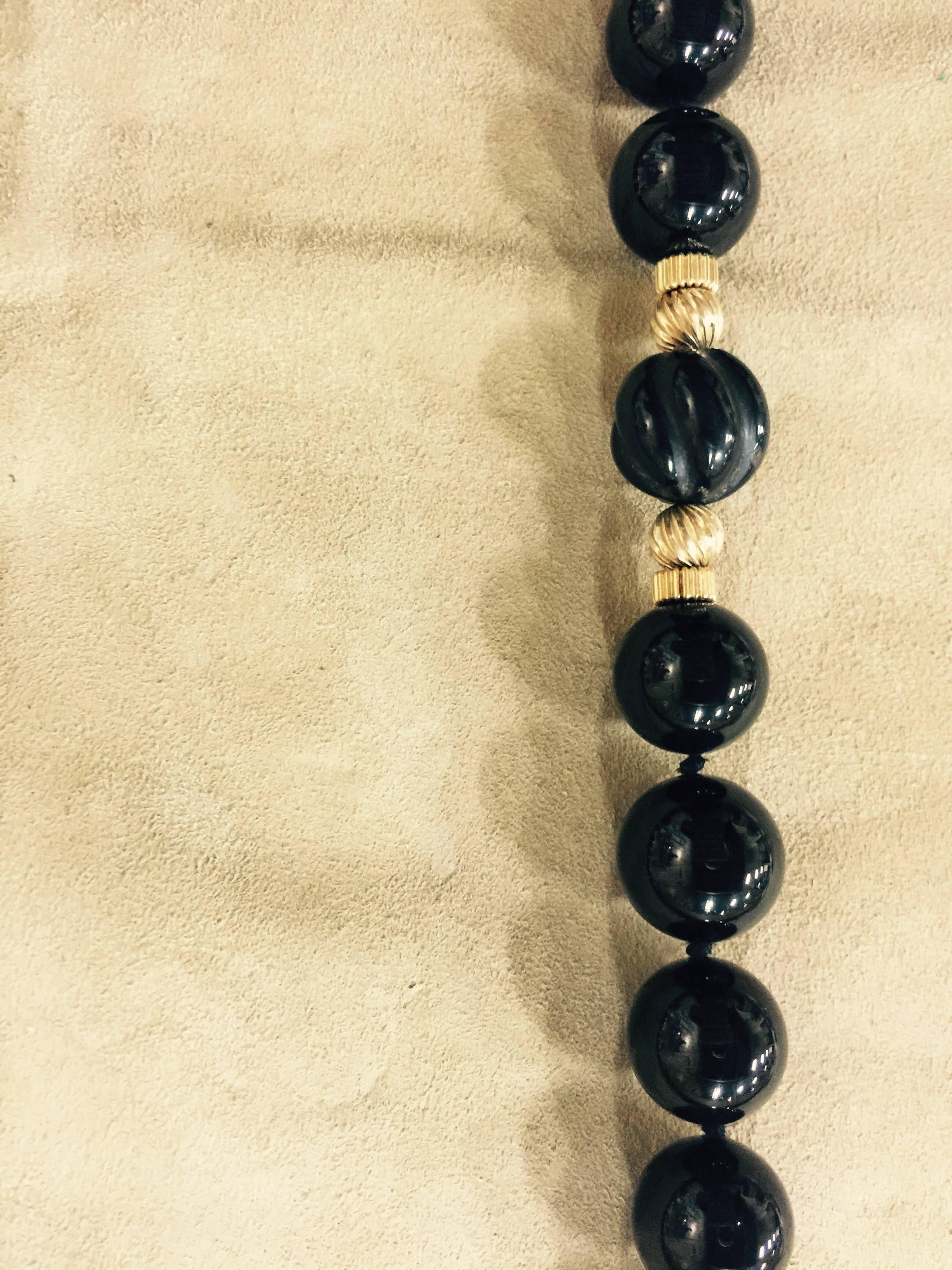 30''  12mm onyx and 14-carat necklace.