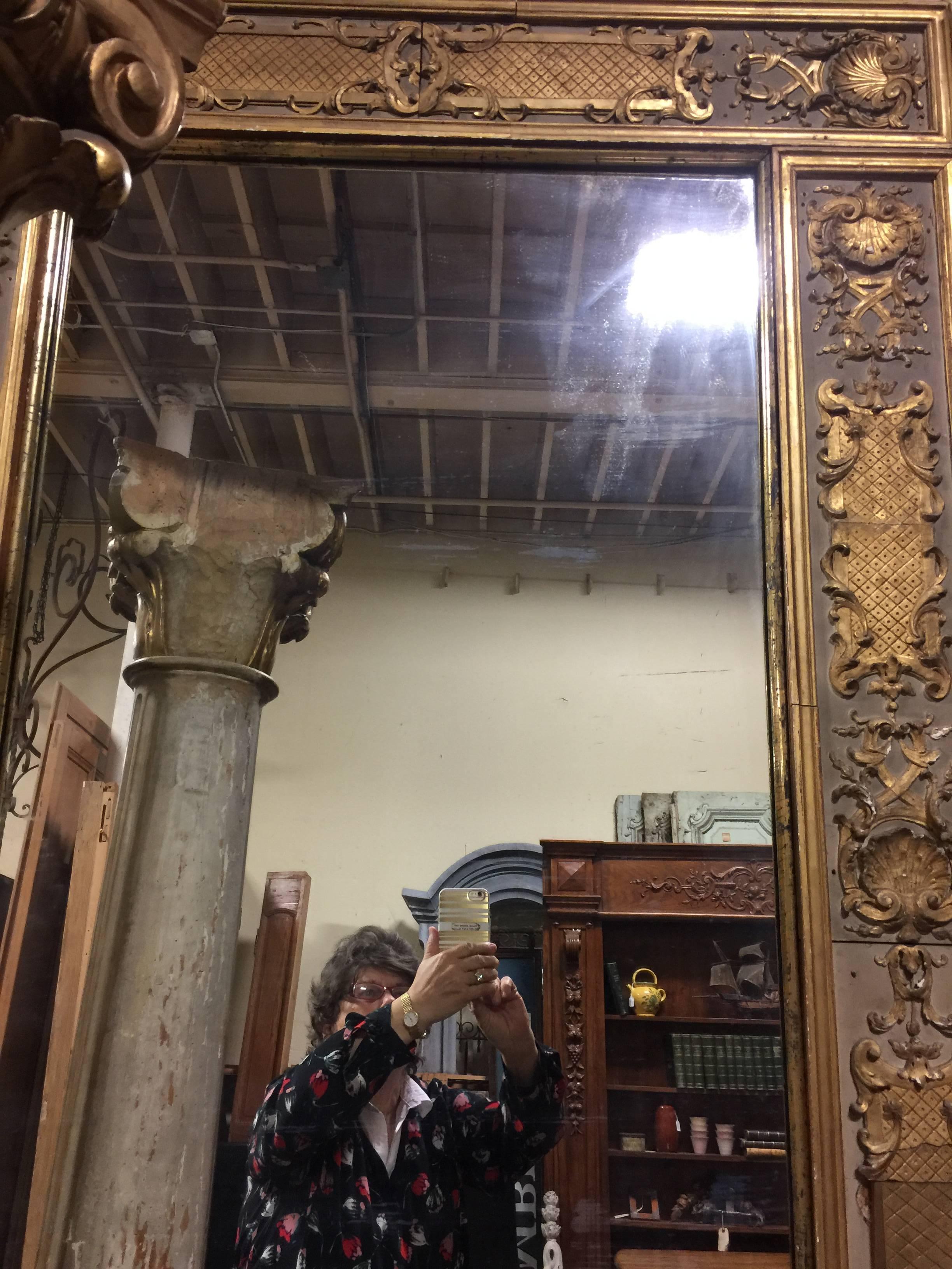 19th century French Louis XIV pier mirrors gold gilt gesso frames.
Sold individually. 
93" H x 40" W x one mirror.
93" H x 44" W second mirror. 
First 5 images are of the 40" W mirror.
Last 5 images are of the 44"