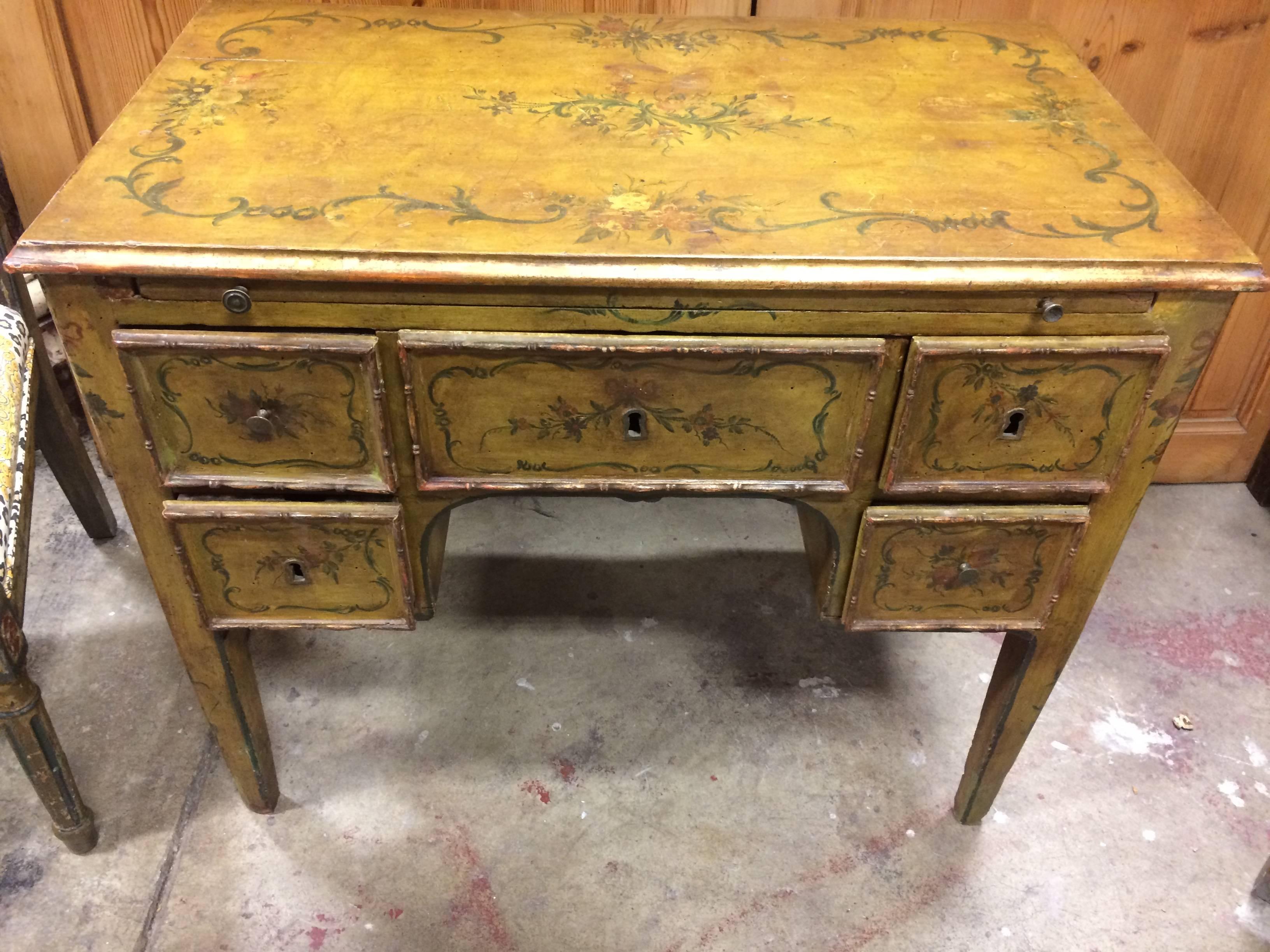 18th century Venetian dressing table with brushing slide with mirror five small drawers polychrome flowers on yellow ground.

Measures: 26.5'' H x 31.5'' W x 19'' D.
Vanity, sofa table, bed size table, entry table.