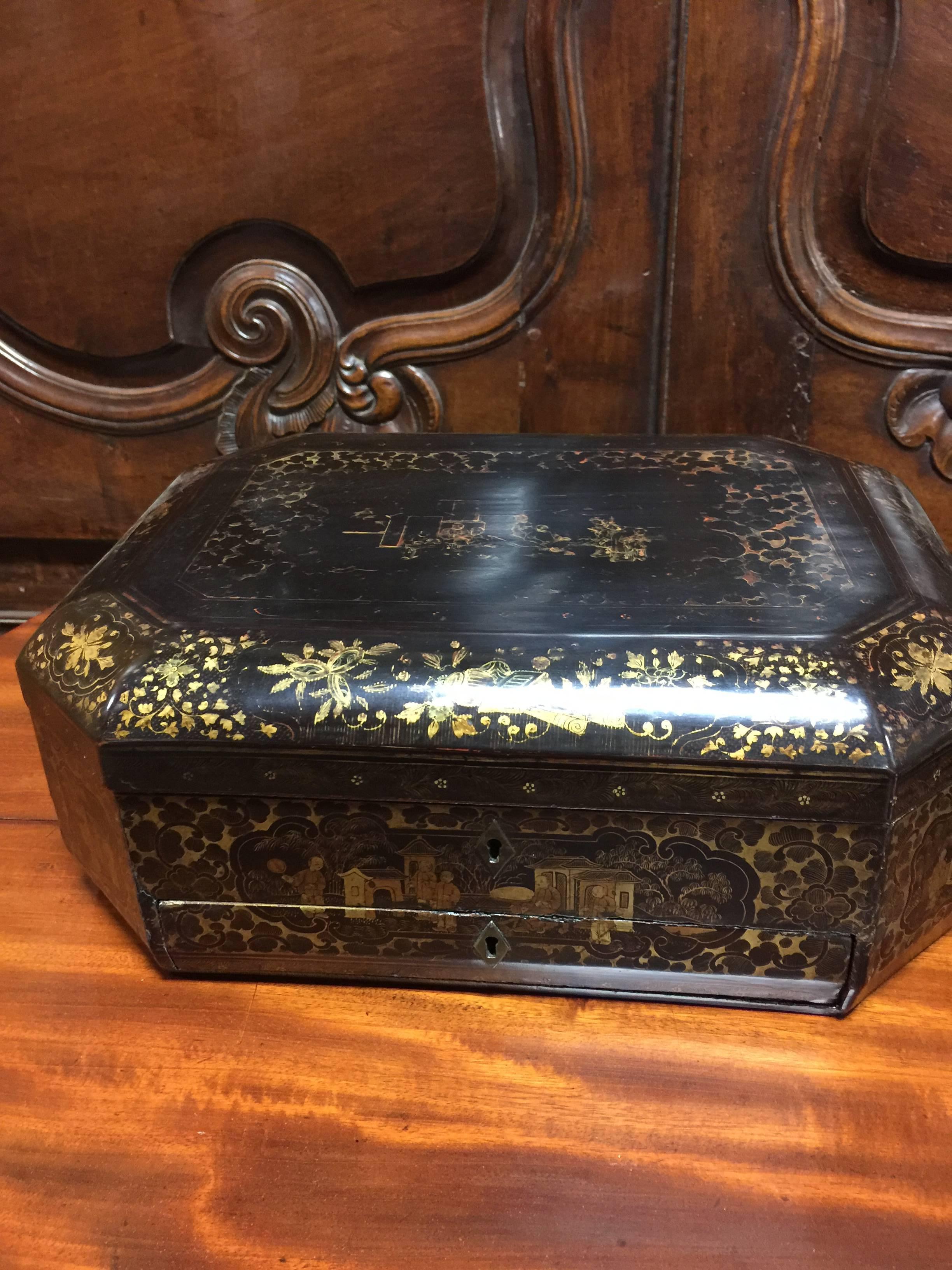19th century lacquered chinoiserie sewing box from France. 
Missing feet.
Decorative accessory, coffee table item, bookshelf accent.