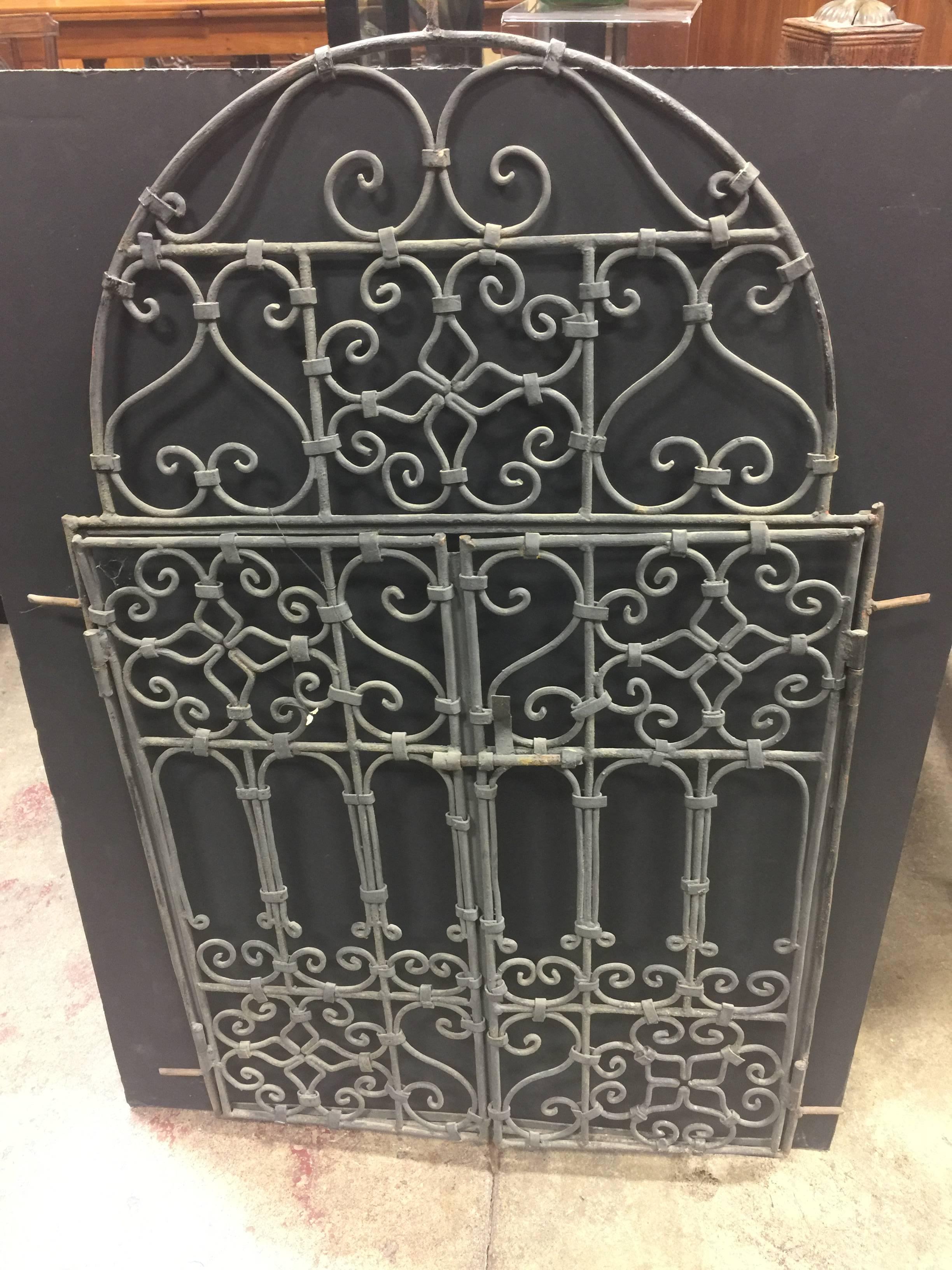 Late 19th century French iron gates
can be used many ways great as decorative hanging.