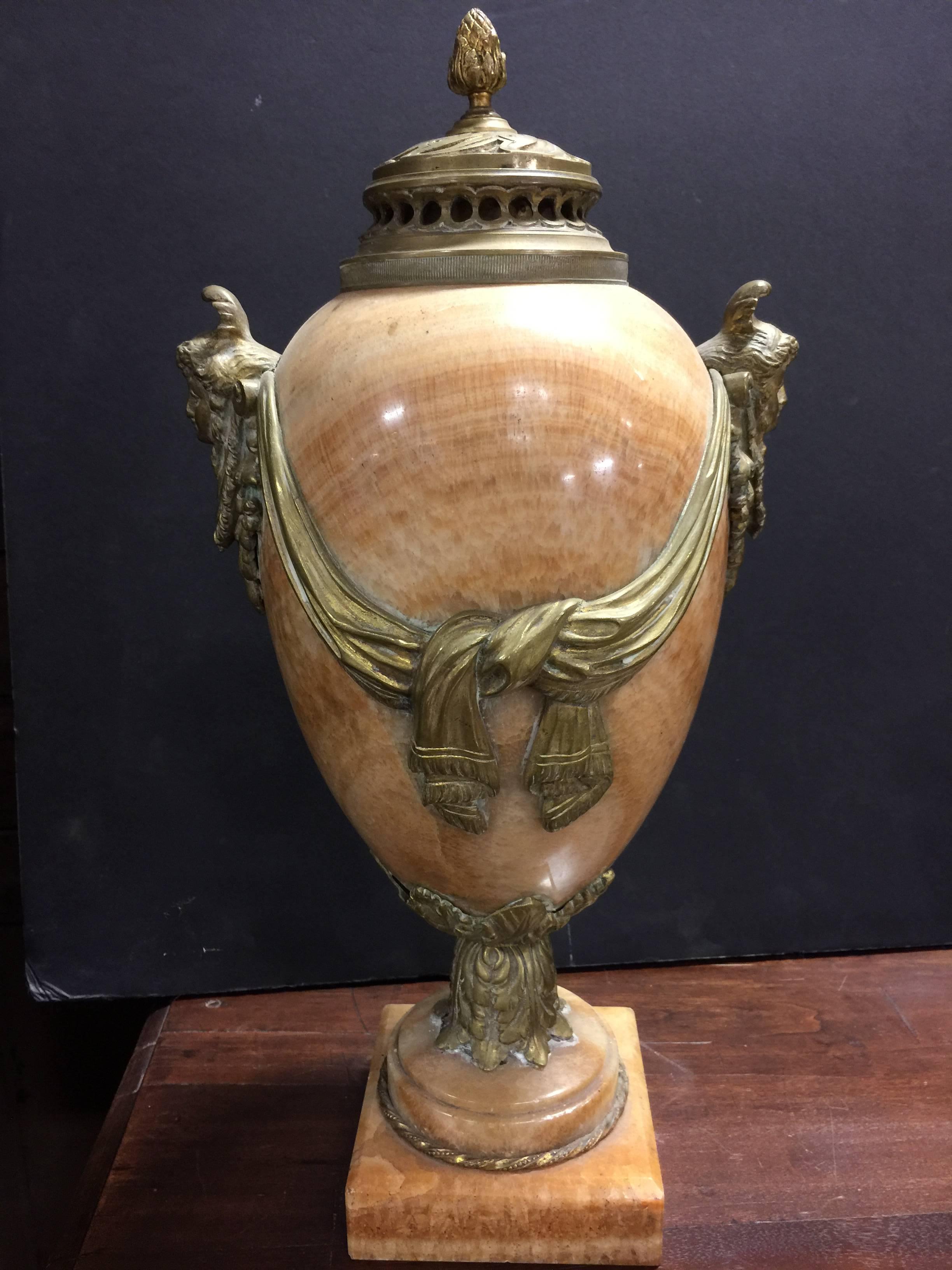 Pair of 19th century French onyx urn with bronze ormolu,

garniture, vases cassoulets.