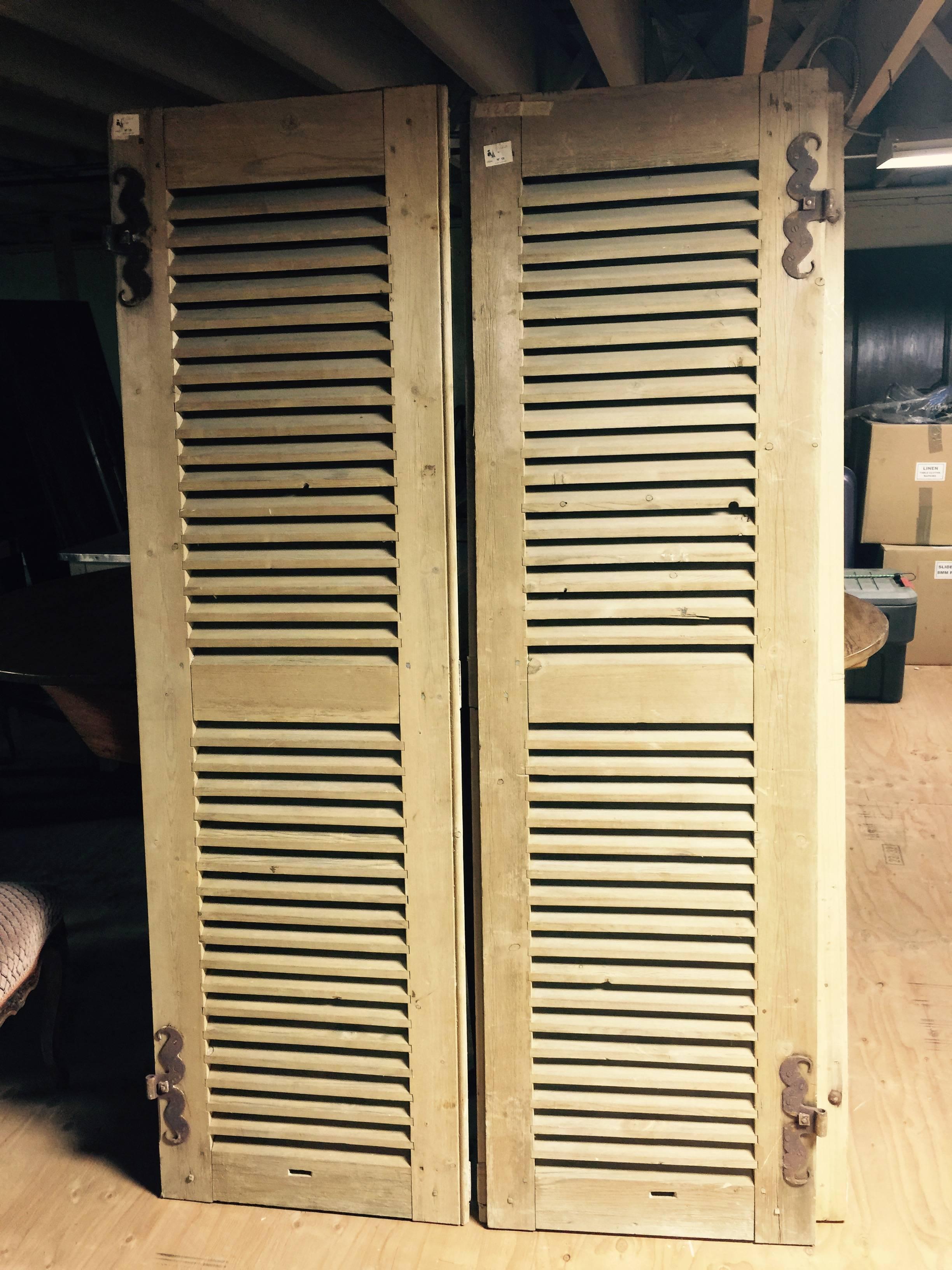 Pair of 19th century French shutters. Color is closer to the images 2 thru 6
another pair available