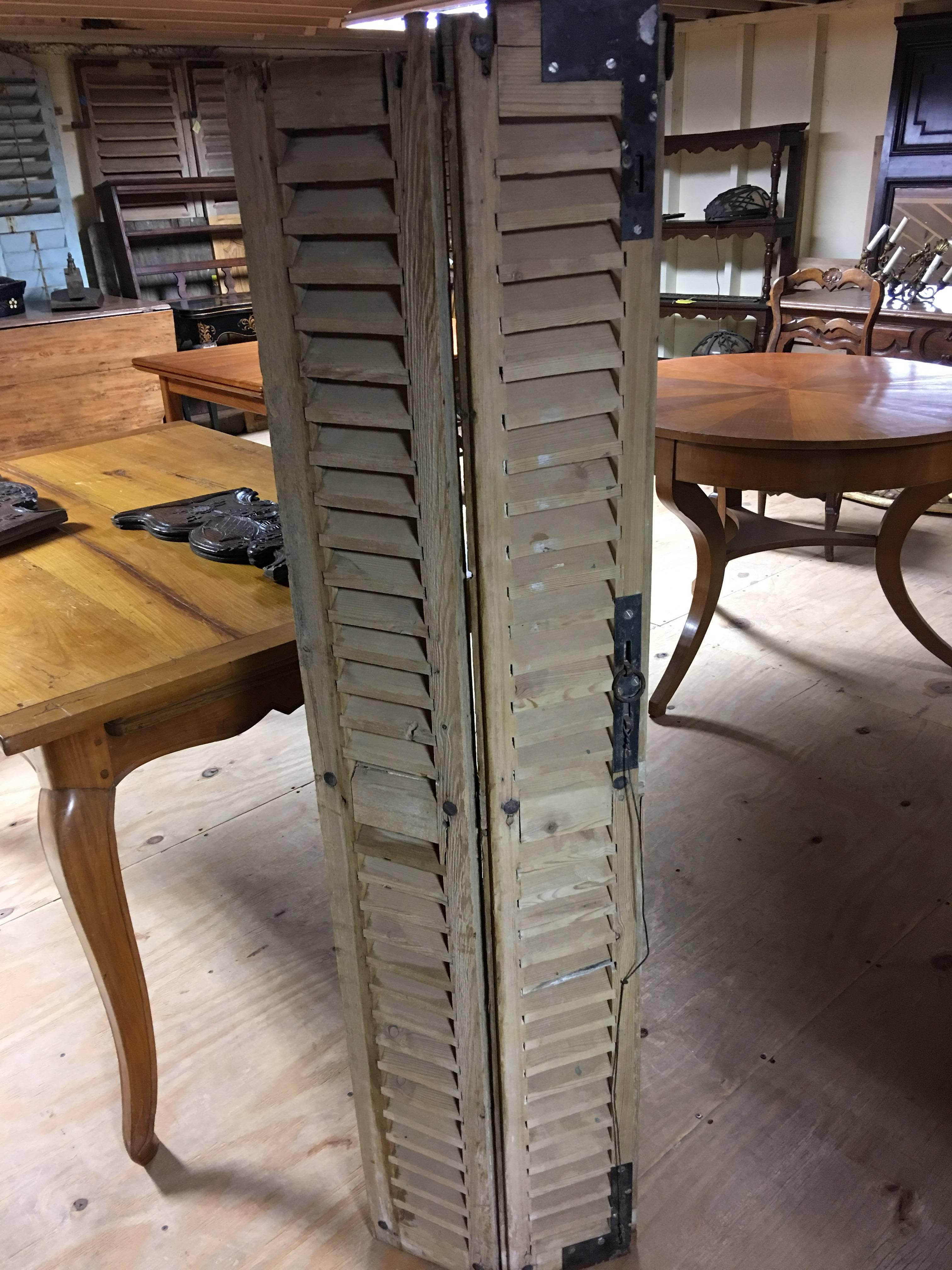 Turn of the 18th century pine shutters (two panes) three sets available.