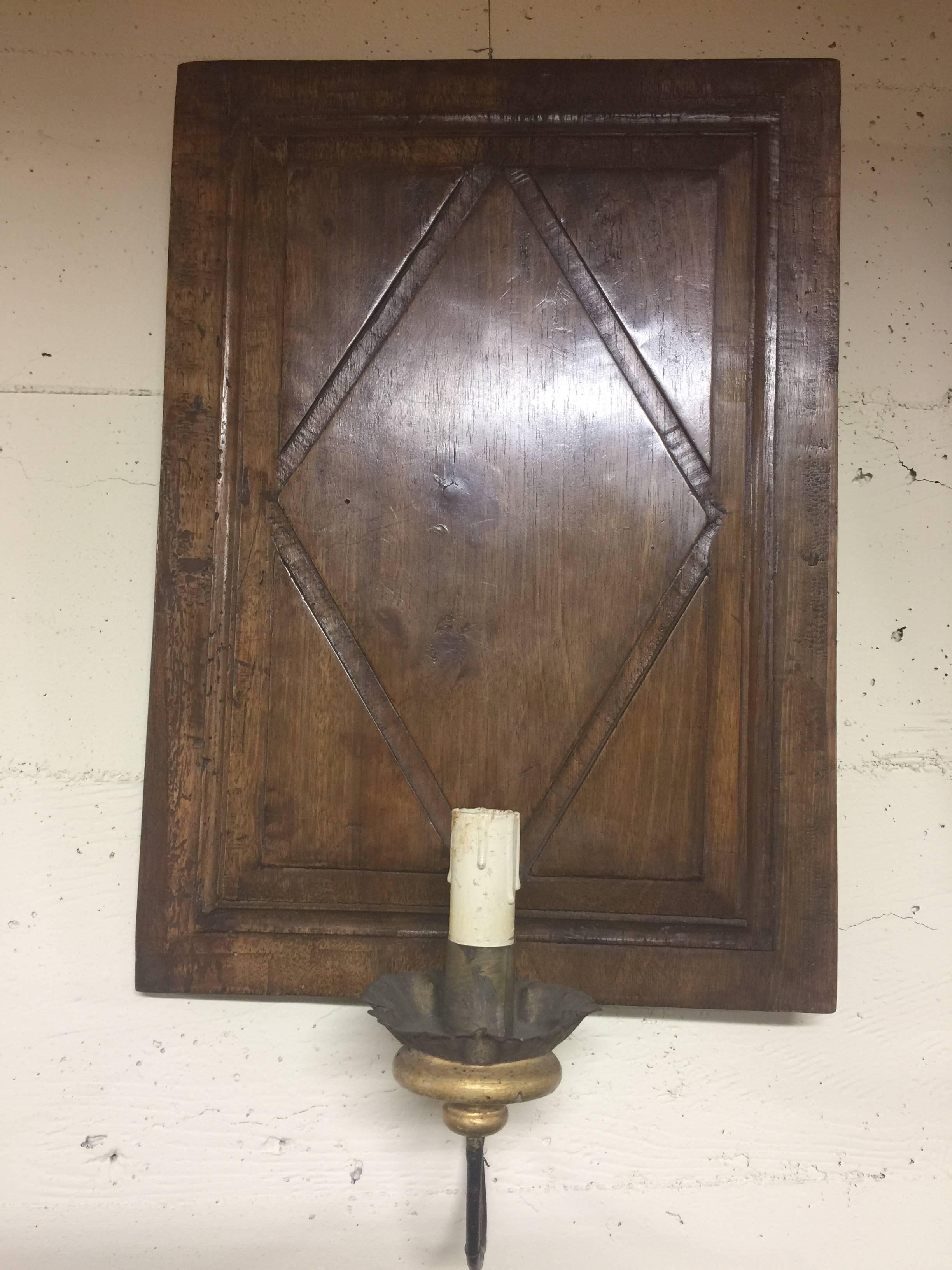 19th century wood panel made into sconce rewired American with wax candle sleeve. Measures: 17.5