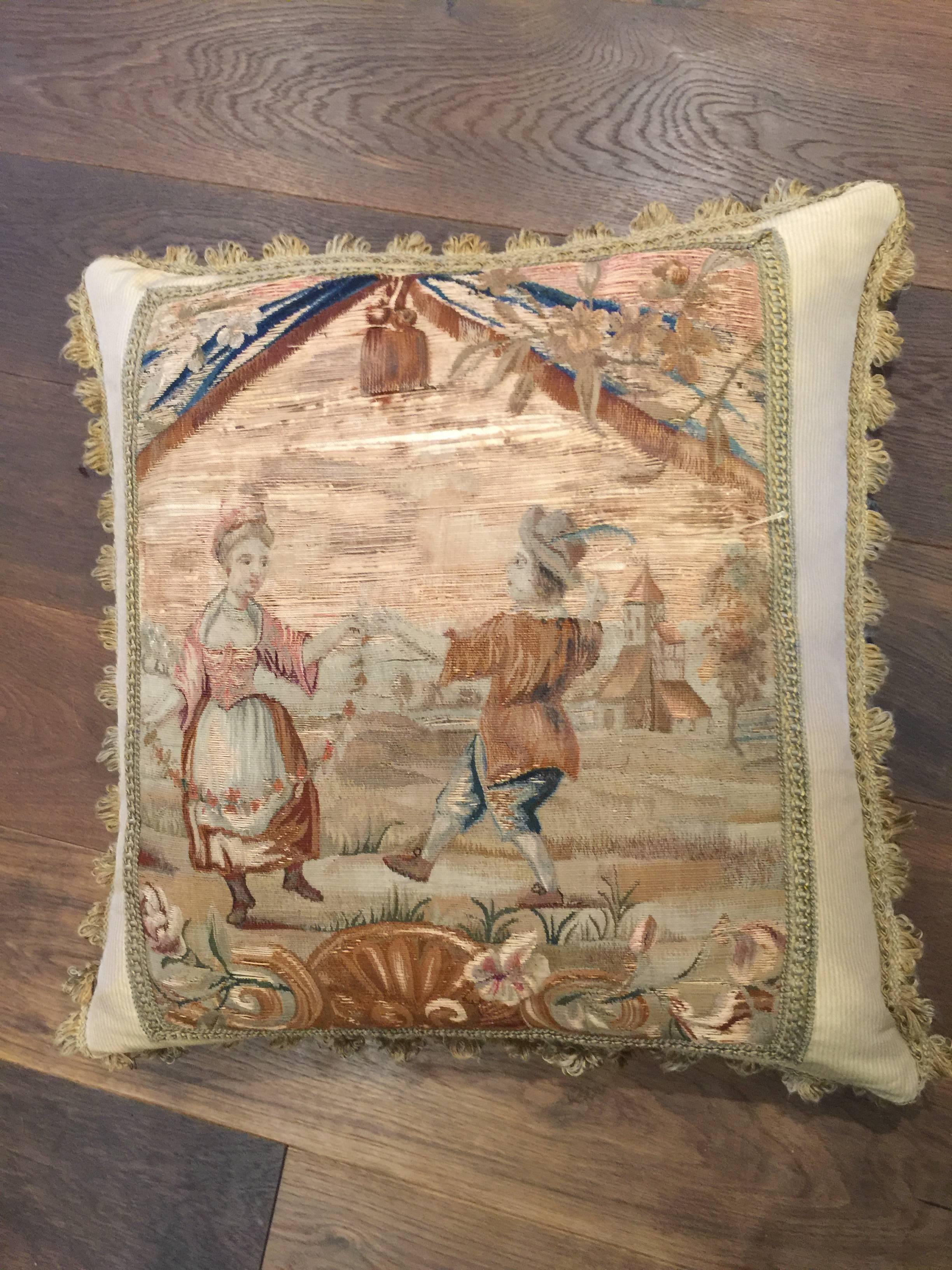 19th century tapestry made into pillow. Measures: 22'' X 22''.