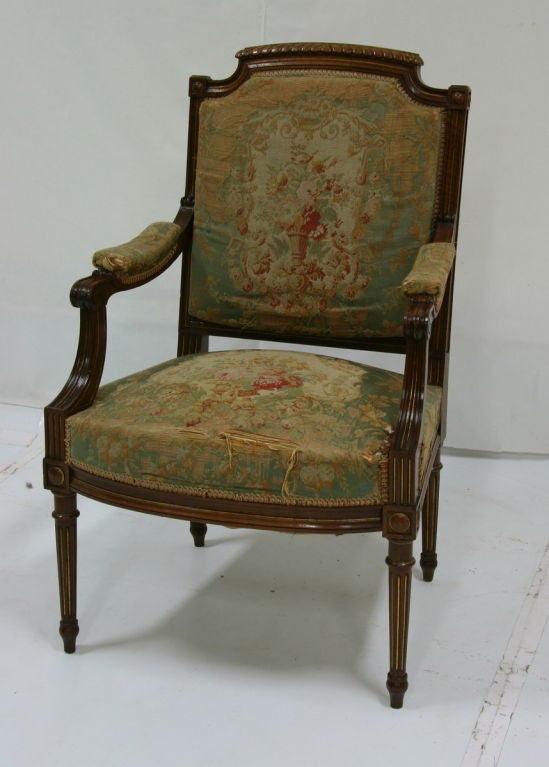 19th century French Parisian armchair with original Beauvais tapestry

Measures: 24'' W x 38'' H x 25'' D (Seat 22'' D x 23.5 W).