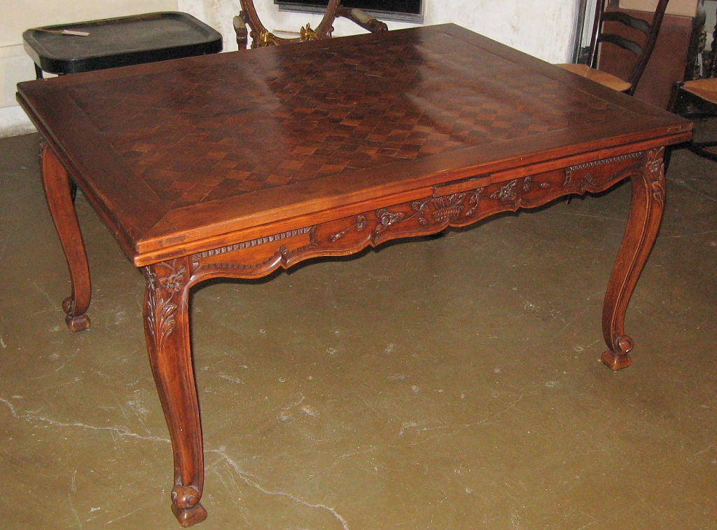 Mid-19th century French walnut parquetry draw leaf table
due to age top is not perfectly even
Early tables did not match the leaves to the top because they used table cloths. If leaves match they are later tables.
Measure: 55' W x 41.5' D x 30' H