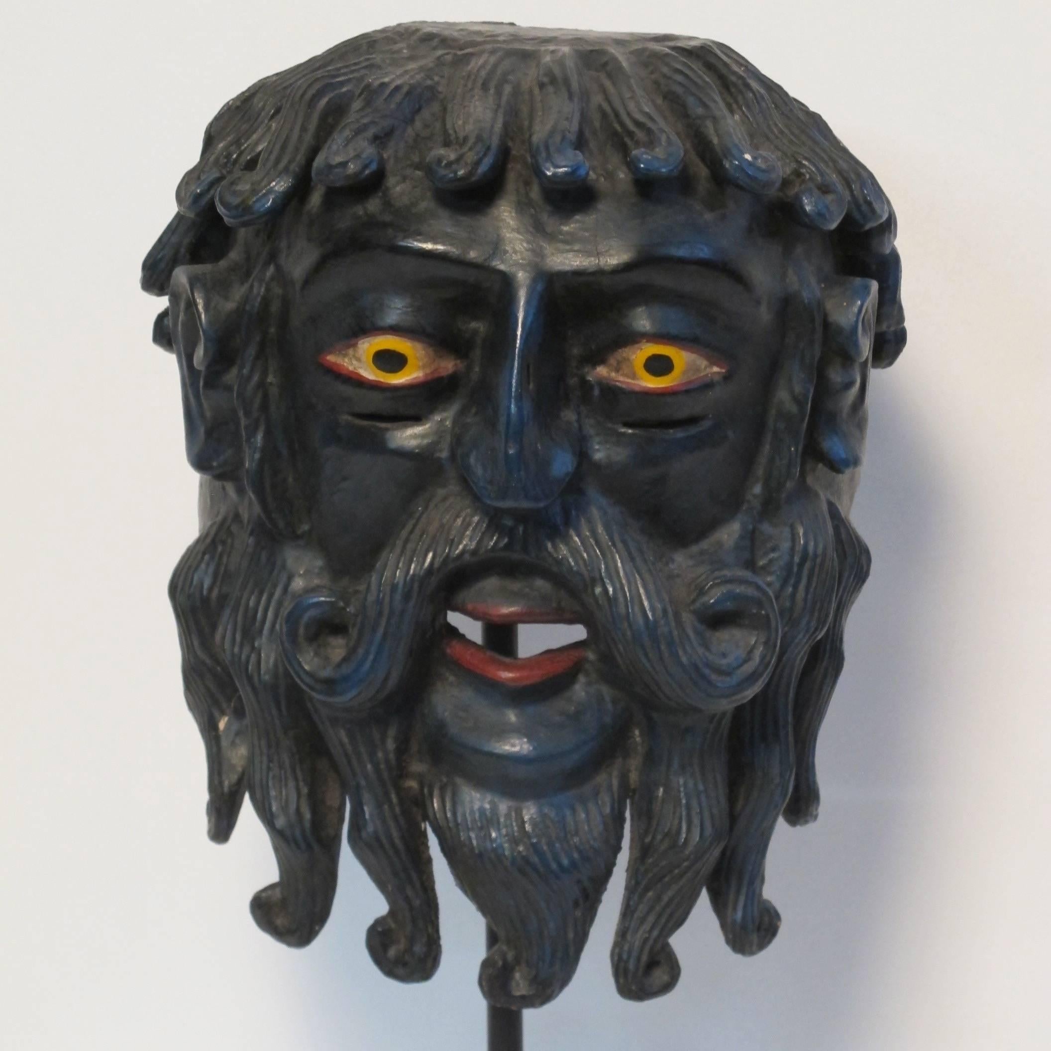 An extremely good hand-carved Helmut mask of the Greek god Poseidon, on museum quality mount.
Original paint and original condition.