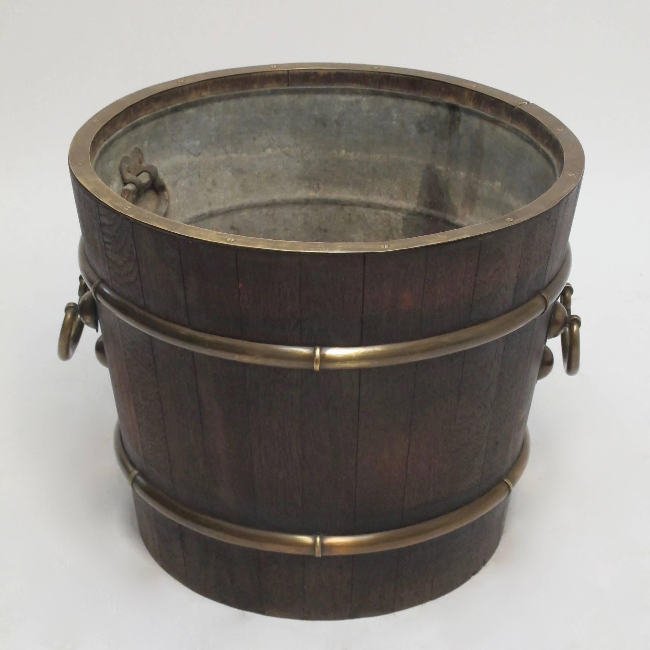 Unusual brass bound elmwood barrel with original zinc liner. China, mid-20th century.