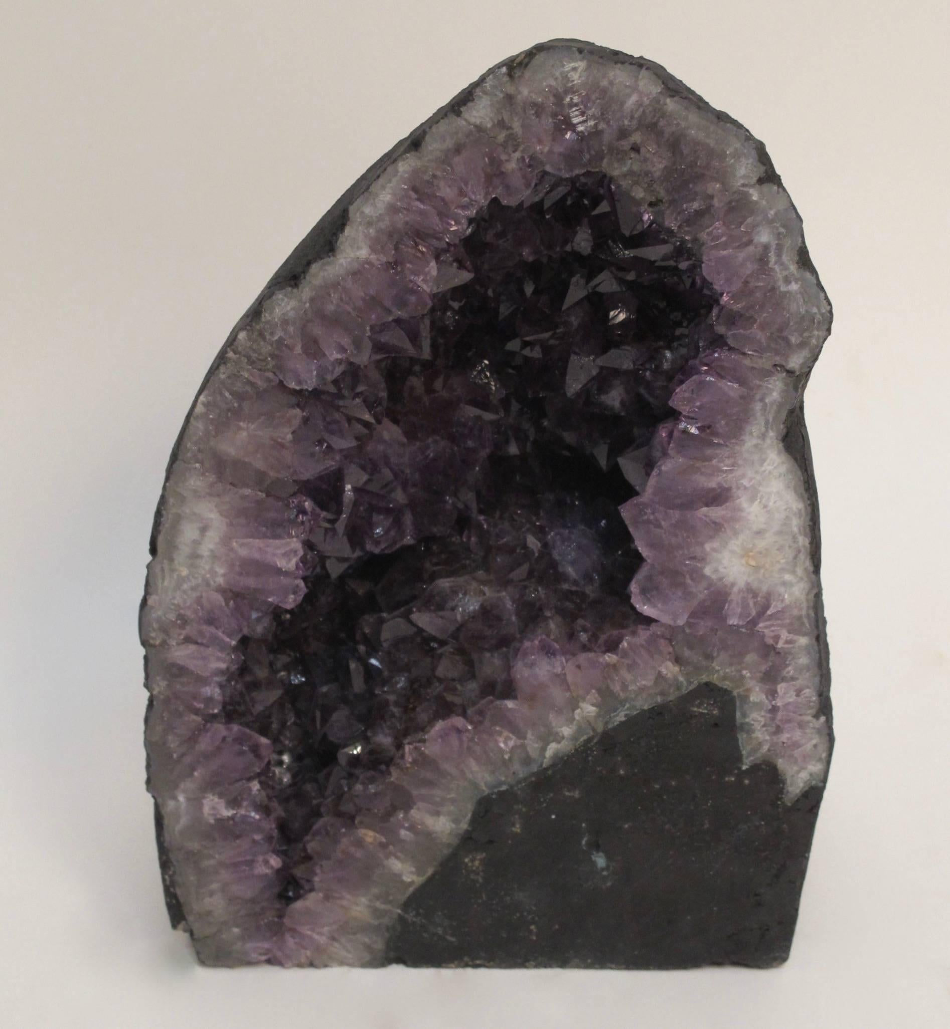 A substantial size natural amethyst geode.