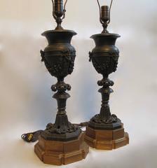 Pair of Bronze Newel Post Urn Lamps
