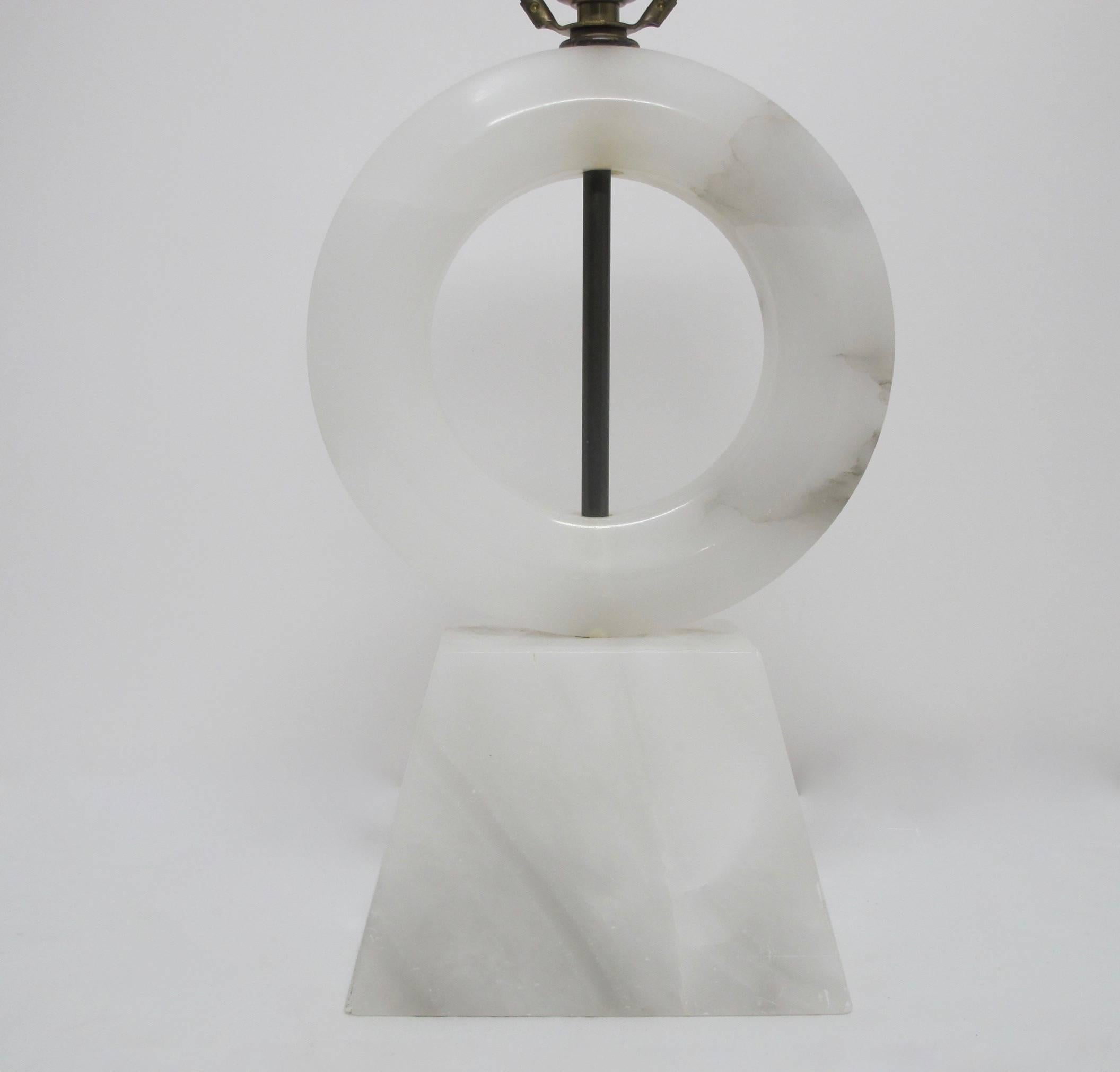 Attractive alabaster table lamp, newly re-wired and holds a single standard size bulb. Measurement of alabaster sculpture not including hardware 12.5 inches high. Shade not included. Europe, mid-20th century.