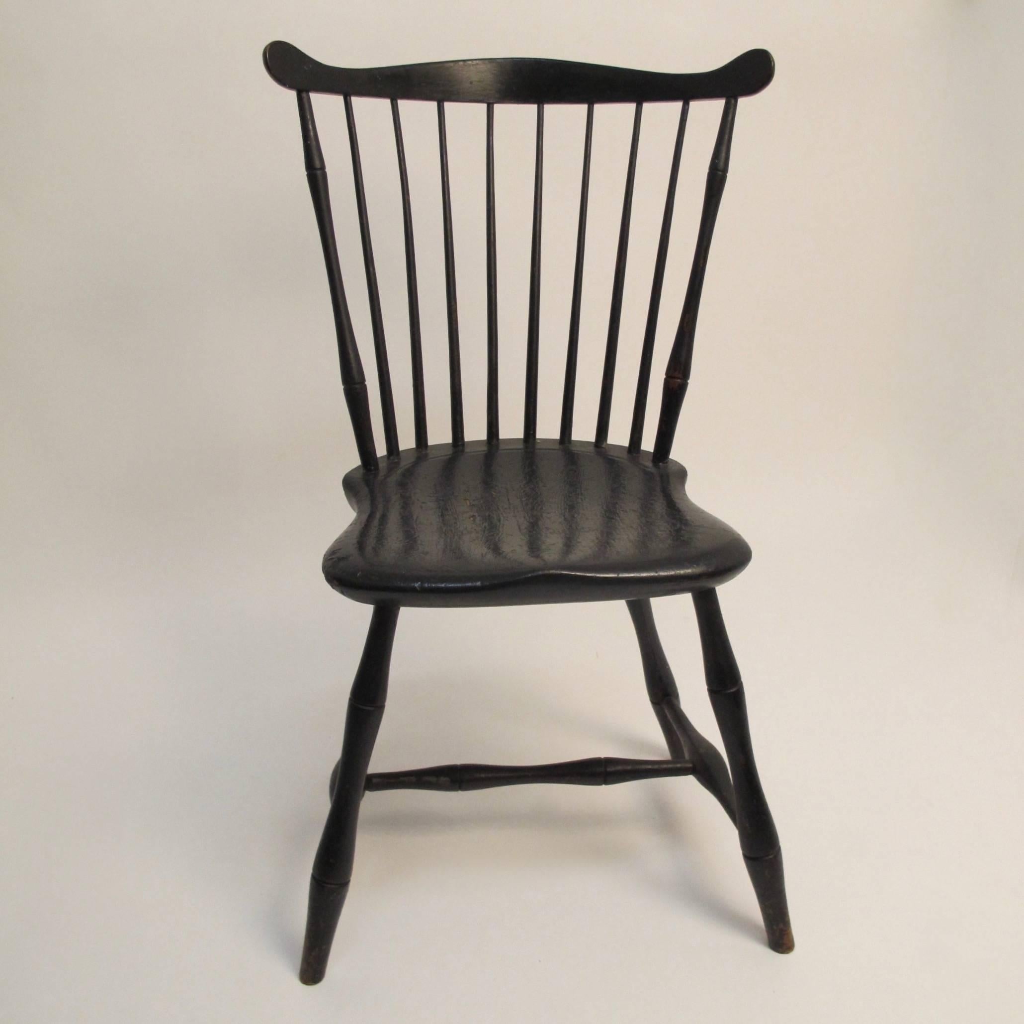 Windsor chair with old (but not original) black paint, American, early 19th century.