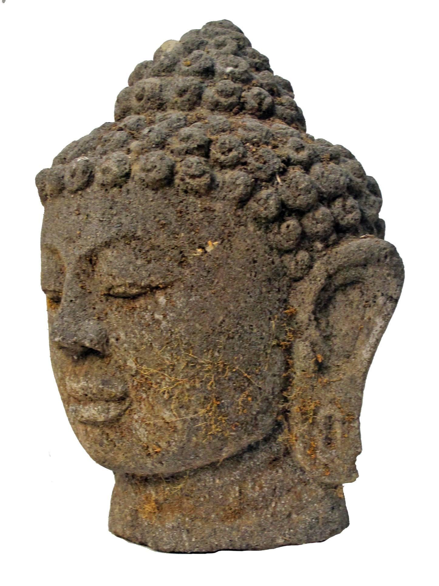 buddha head stone sculpture