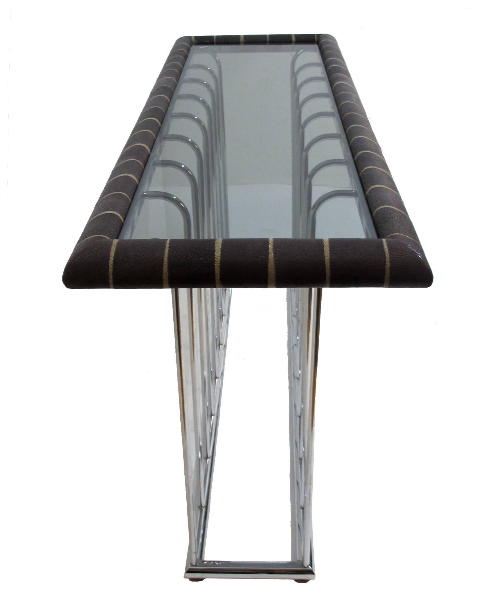 Very nice gray with white stripe Shagreen and smokey glass top chrome console table with chrome spindles into a tubular chrome base. Possibly custom-made, circa 1980.