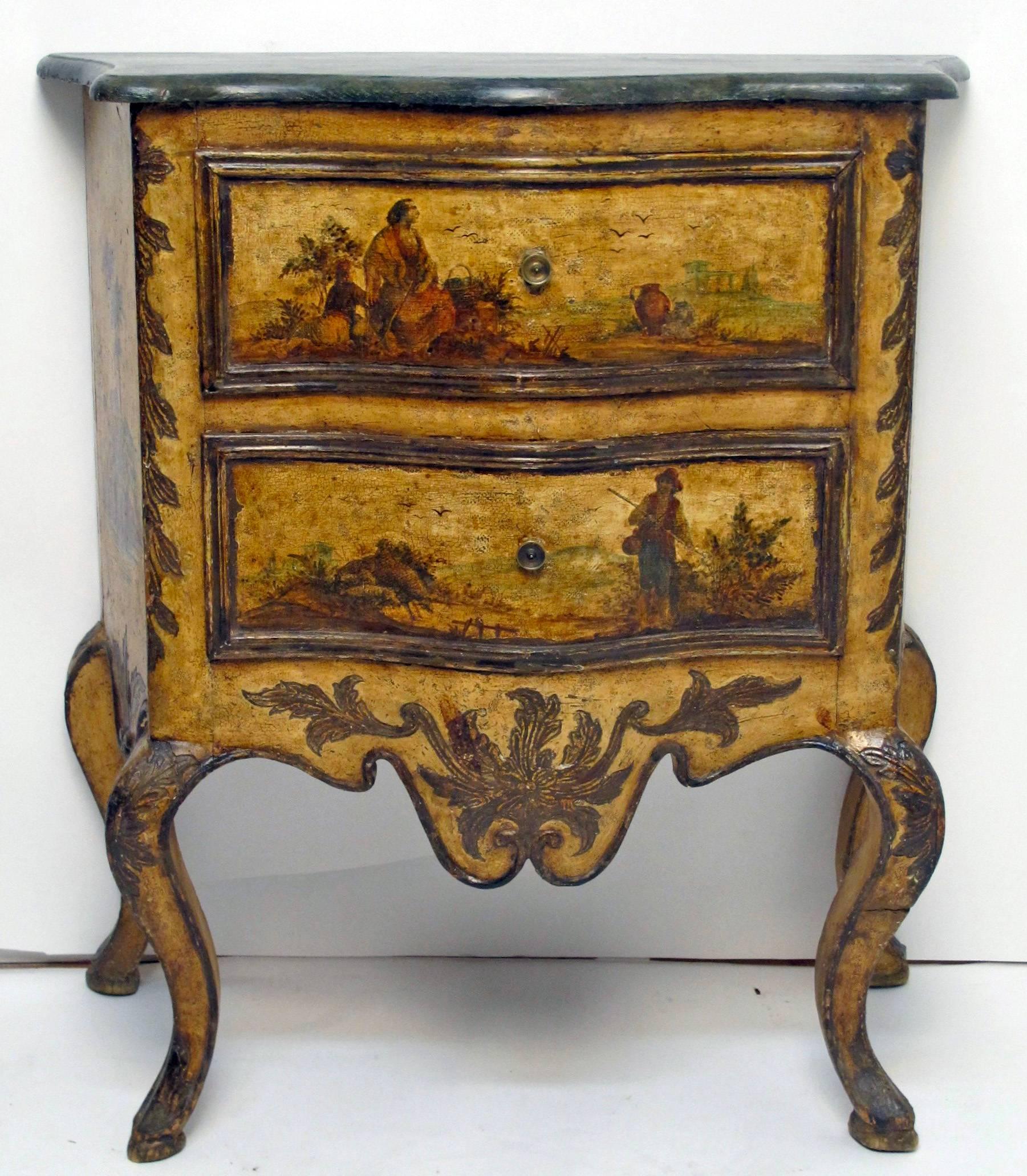 An exceptional pair of Lacca Povera small commodes or chest of drawers. Beautifully painted in excellent mostly original condition with minor restoration on the faux finished tops. Italy, early 19th century.
Lacca Povera is a decorative finishing