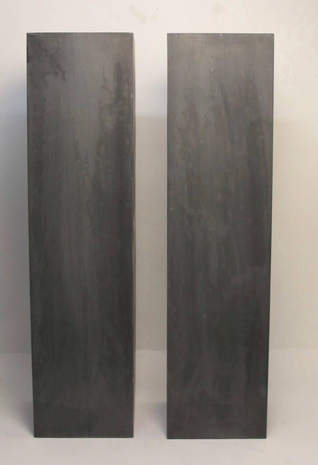 A large high quality pair of architectural zinc pedestals.