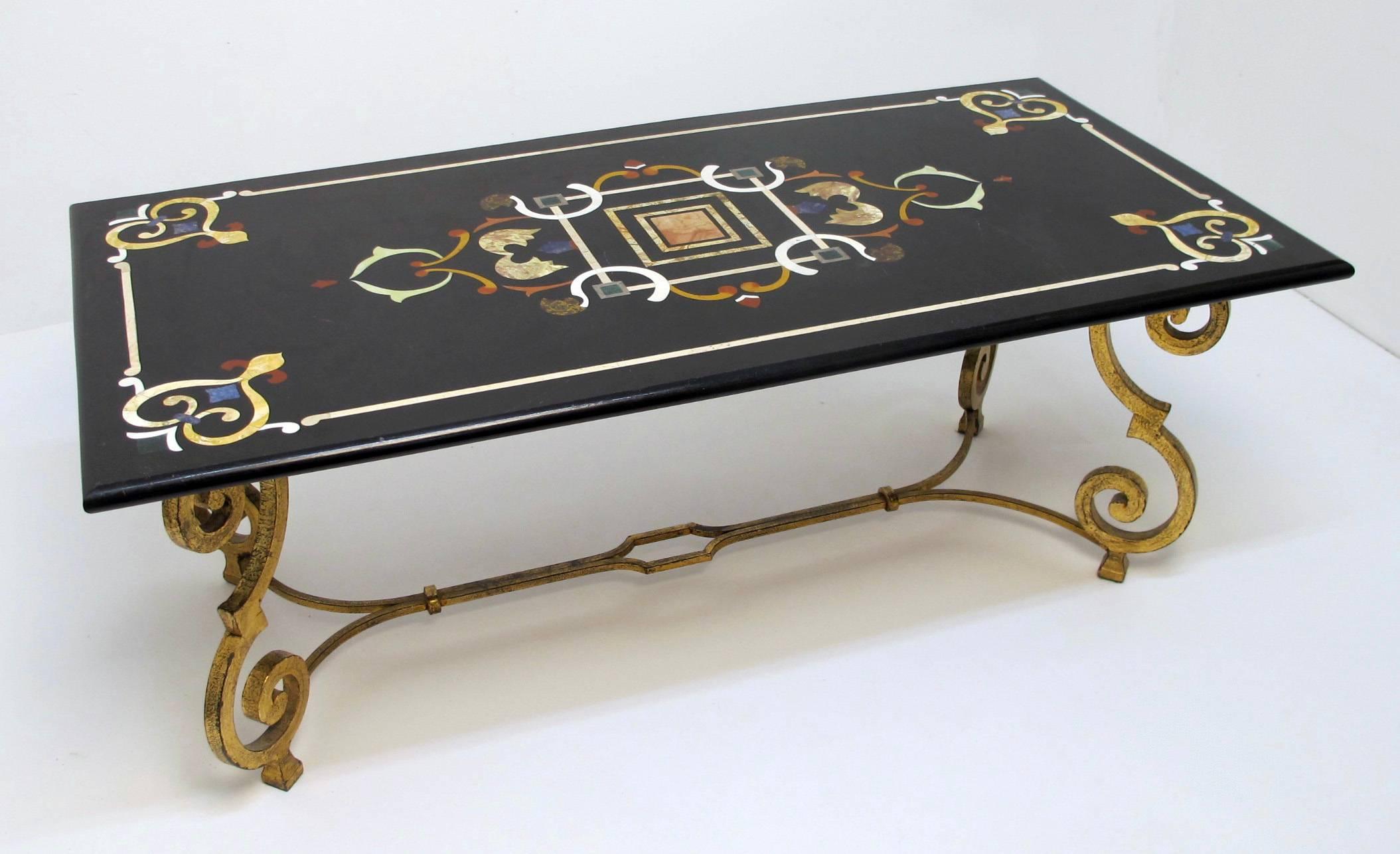 Exquisite coffee or cocktail table with beautiful gilt wrought base and pieta dura (inlaid stone) top, Italy, mid-20th century.