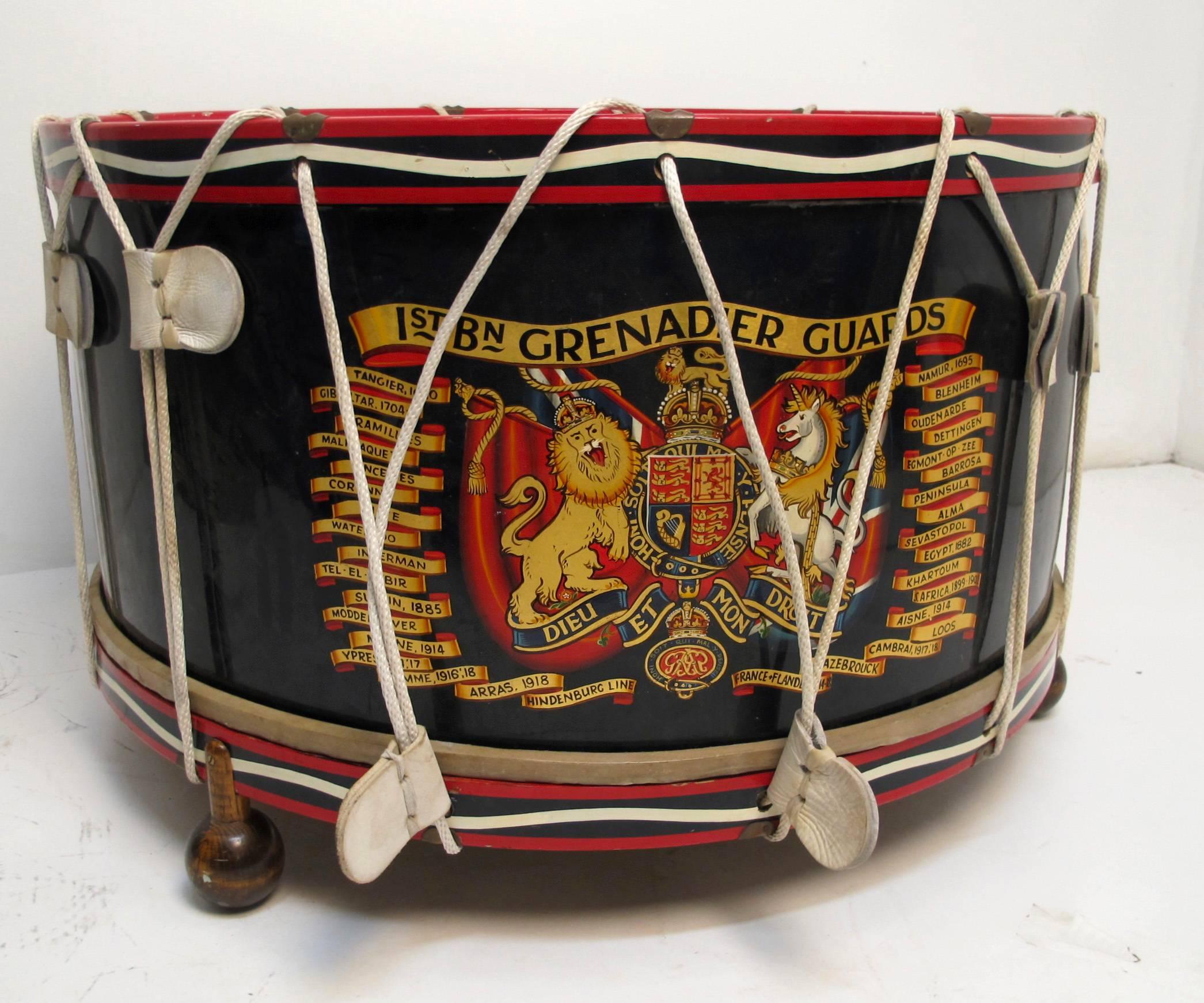 An early 20th century large parade drum made by the English company George Potter & Co. Still retains its original makers label. Now converted to a table, feet have been added at the base (shipped without glass top.)